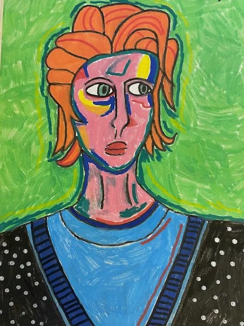 Colorful abstract painting of a person with orange hair, pink face, and green eyes, lying on a blue surface with a starry black background and a green background.