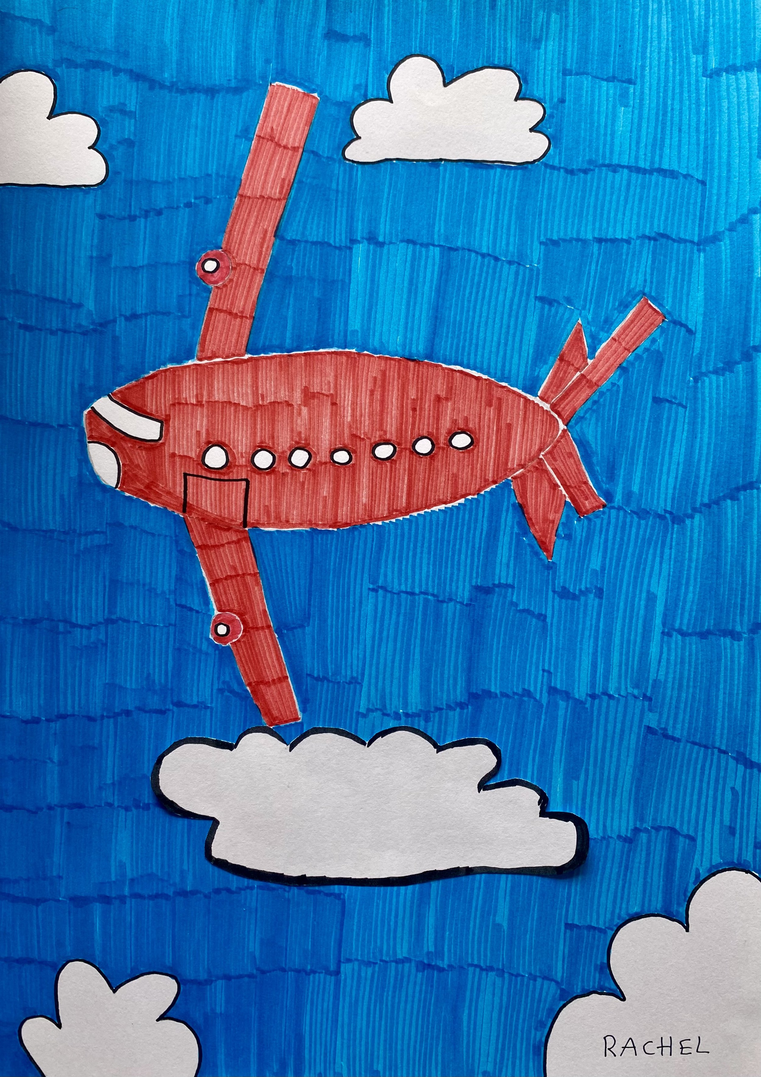 red plane with blue sky and clouds backdrop