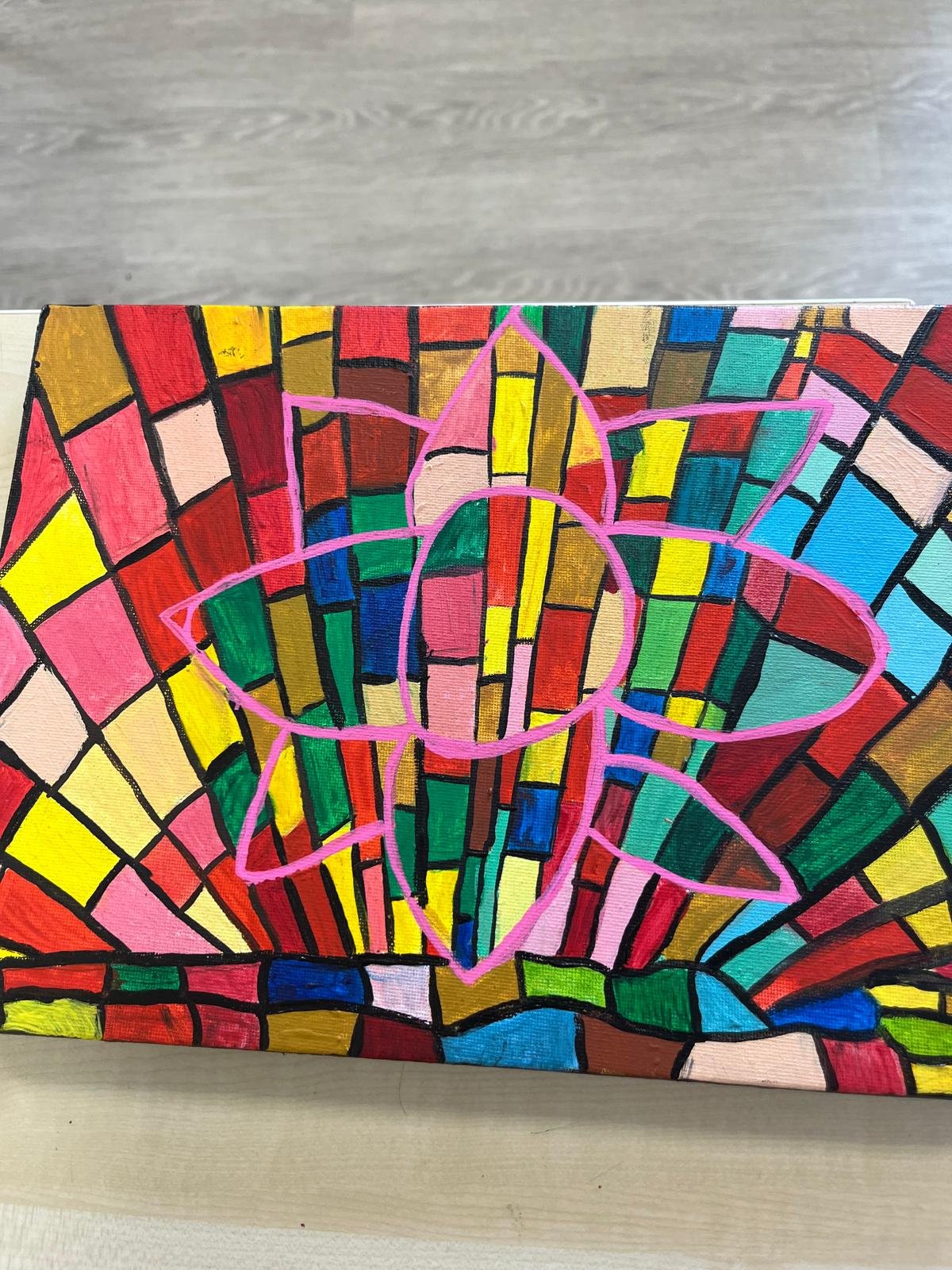 painting of a bright mosaic glass with a flower image