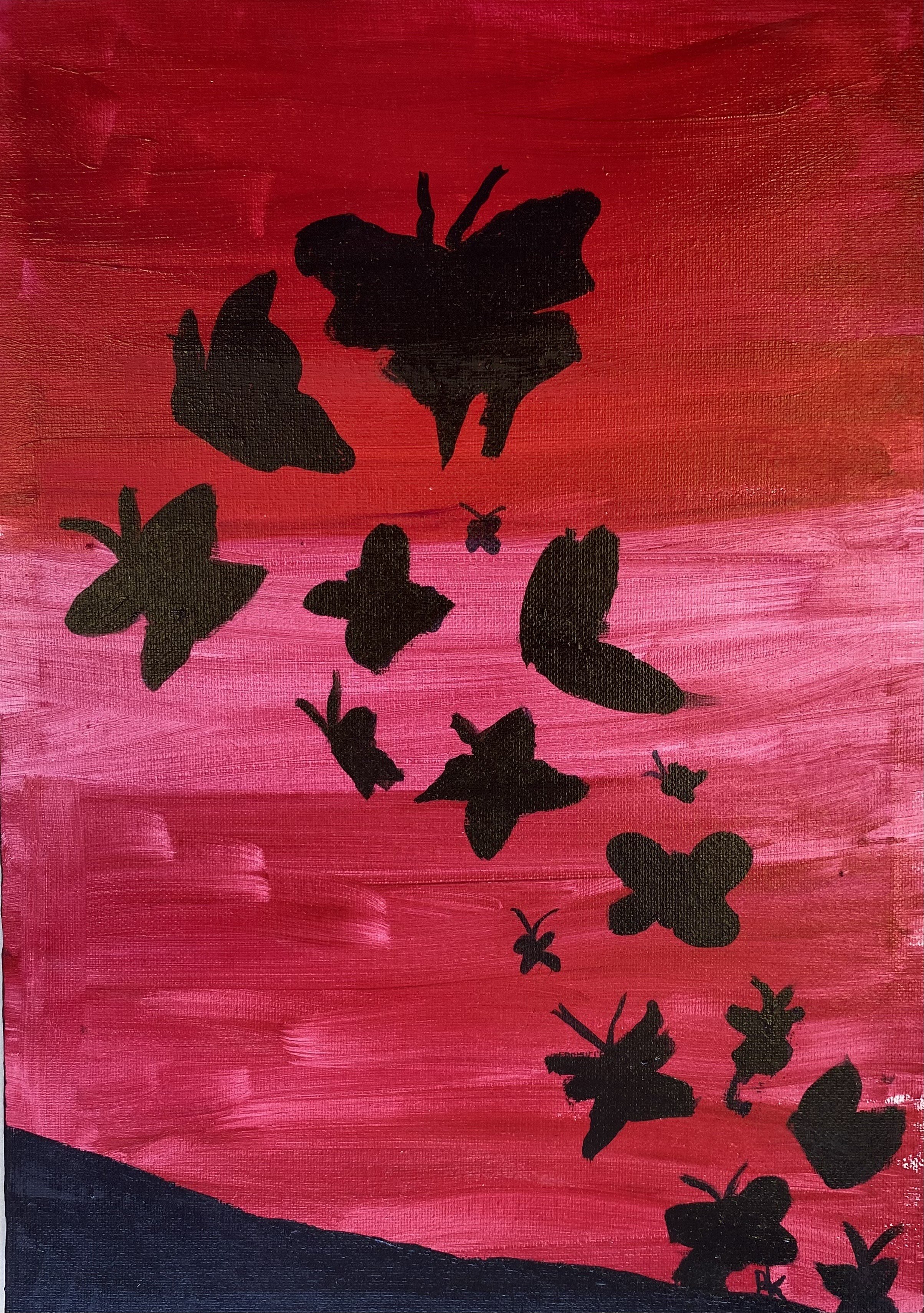 black butterlies with sunset backdrop