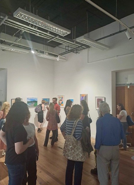 Group of people in an art gallery