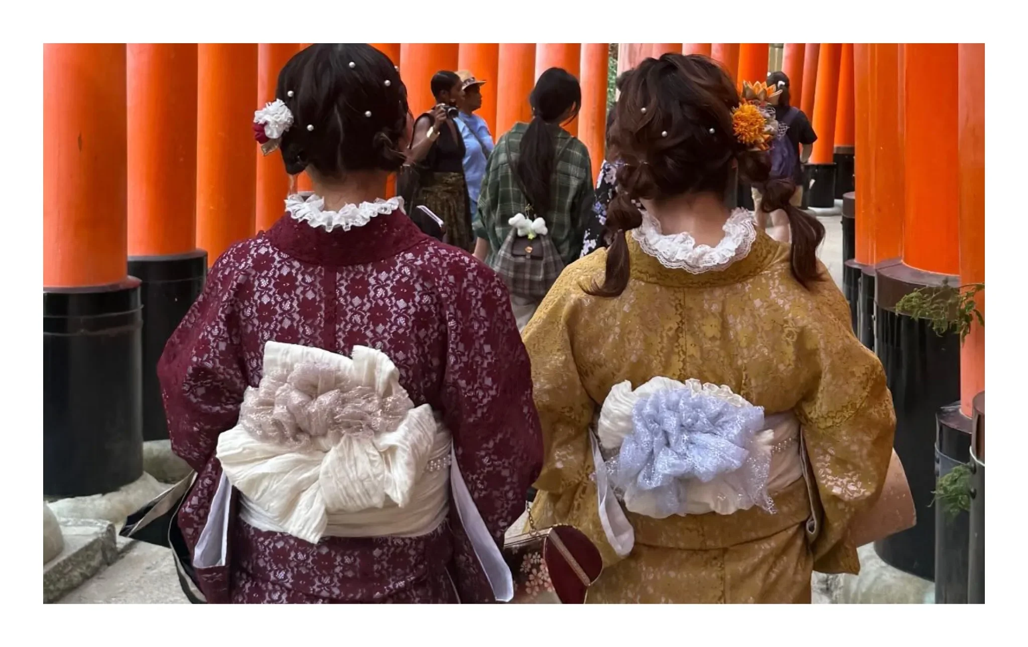 Cultural experience in traditional kimonos during a tour in Japan, reflecting worldwide fly-me-to (FMTY) travel partnership services.
