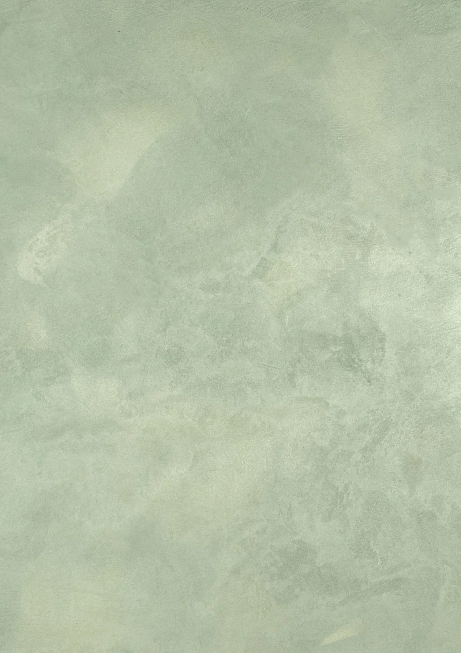 Light green textured surface, possibly a painted wall or floor.