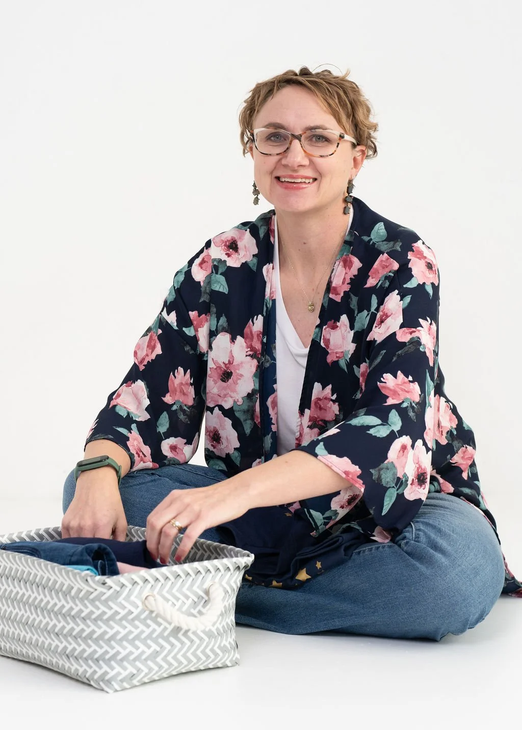Ashley Strukel, shown here folding clothes,is a professional organizer serving Jamestown, ND, and the surrounding areas.