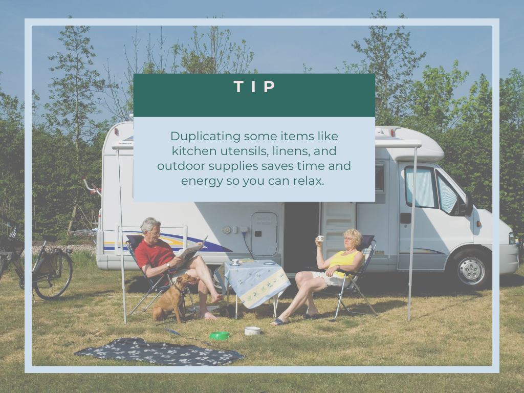 Couple enjoys sitting in front of their RV. Tip says it's OK to duplicate some items to save time packing when camping.