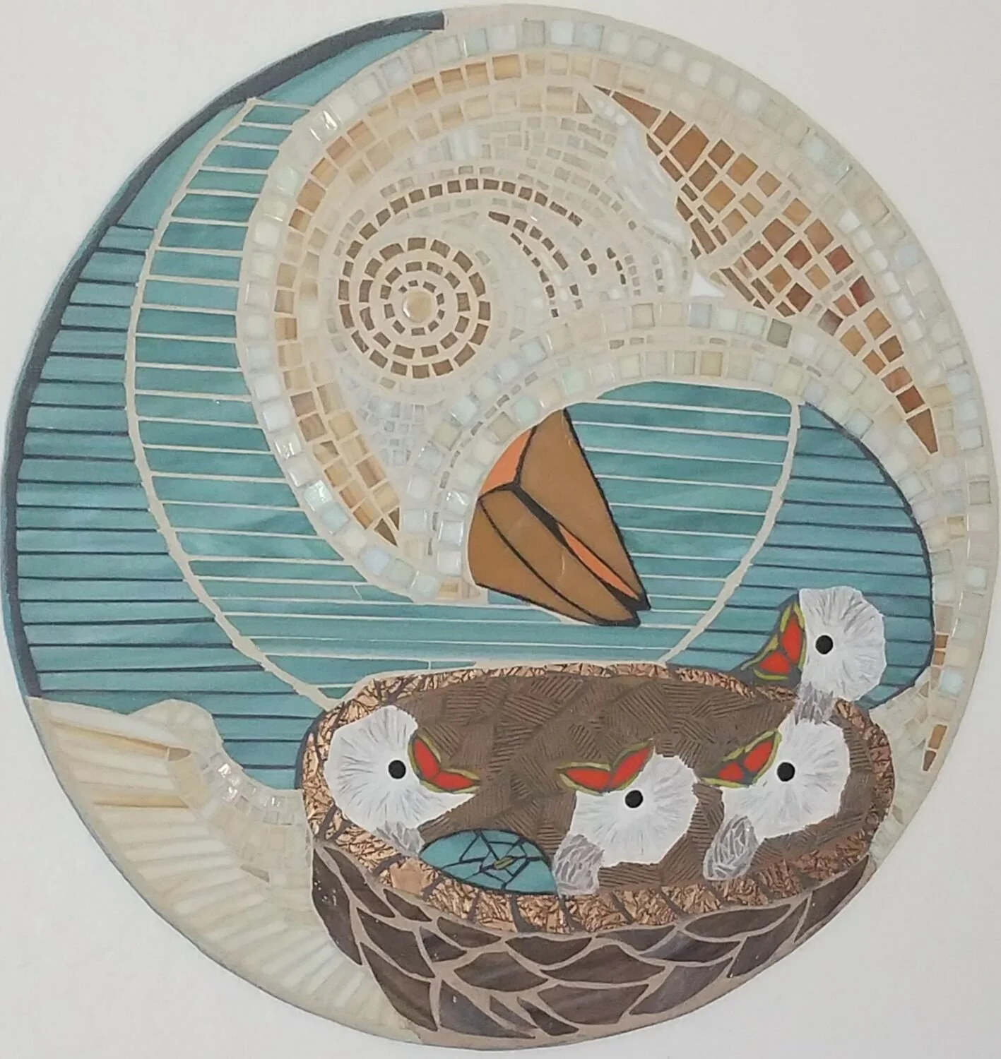 "Hello Bird" by Amelia Williams
23 x 23 Mixed Media
NFS

Mosaic: Art glass and sea spines on handcrafted substrate
Birth and new life creates a restart for all involved. This mother bird is wide-eyed as she beholds her nest. Each chick represents mem