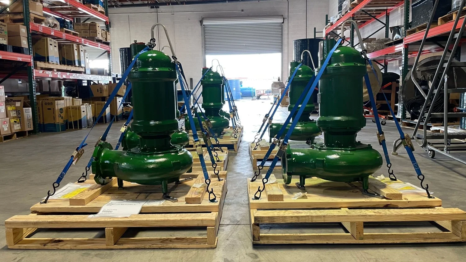 Large submersible pumps prepared for shipment
