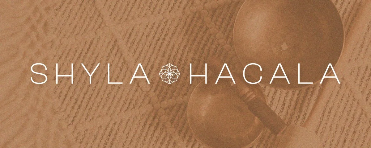 A logo overlay with the text 'SHYLA HACALA' on a textured background, featuring two glass cups and a pen.