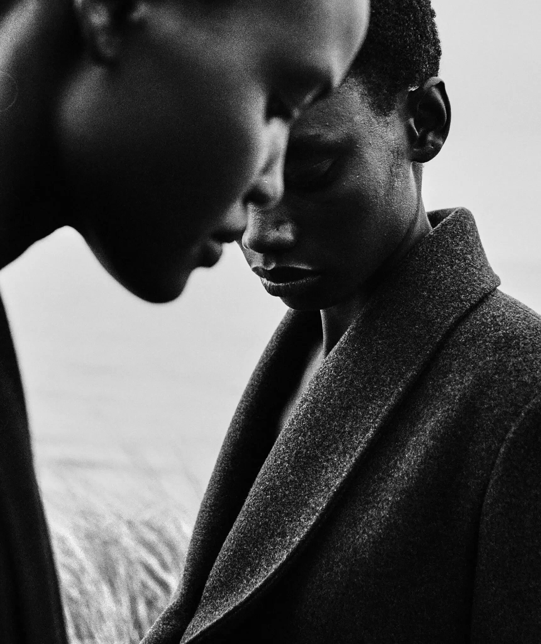 Female model with Dior coat silhouetted in front of a serene Scottish coastline. 

Photo by Jack Davison for T: The  New York Times Style Magazine.

Produced by Mini Title.
Local Production and Locations provided by Amelia & Co Productions, Edinburgh