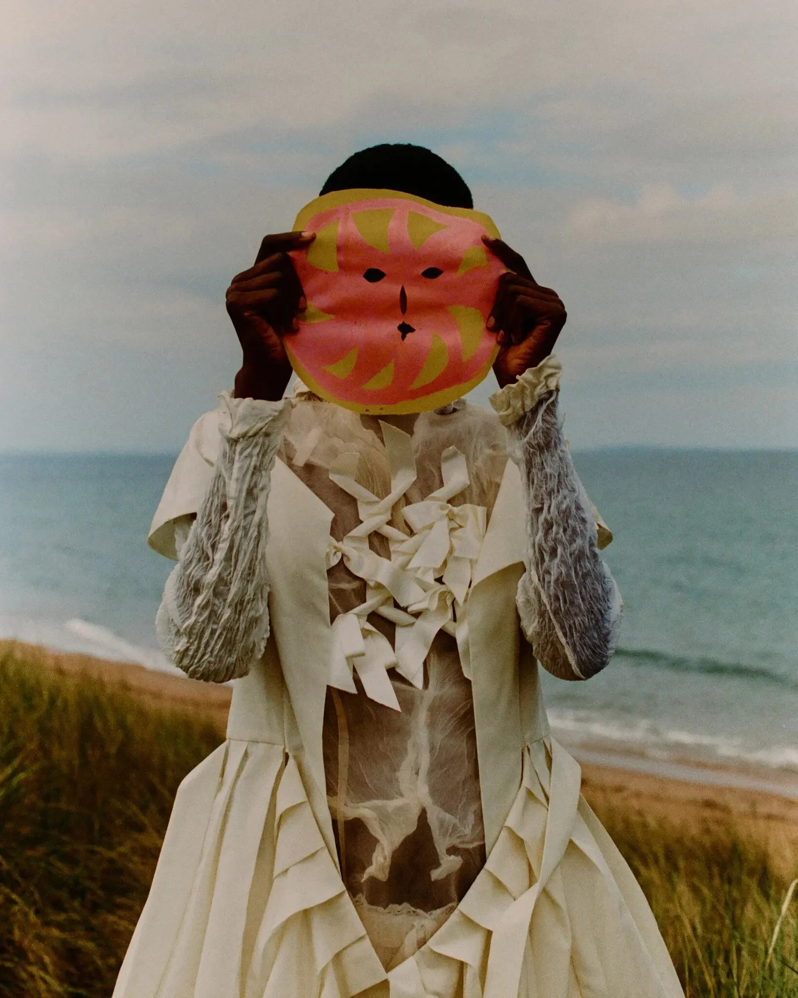 Model wears Simone Rocha dress; and Phoebe English top (worn underneath).
Credits: Photograph by Jack Davison. Styled by Raphael Hirsch. Local Production and Locations provided by Amelia & Co Productions, Edinburgh, Scotland.