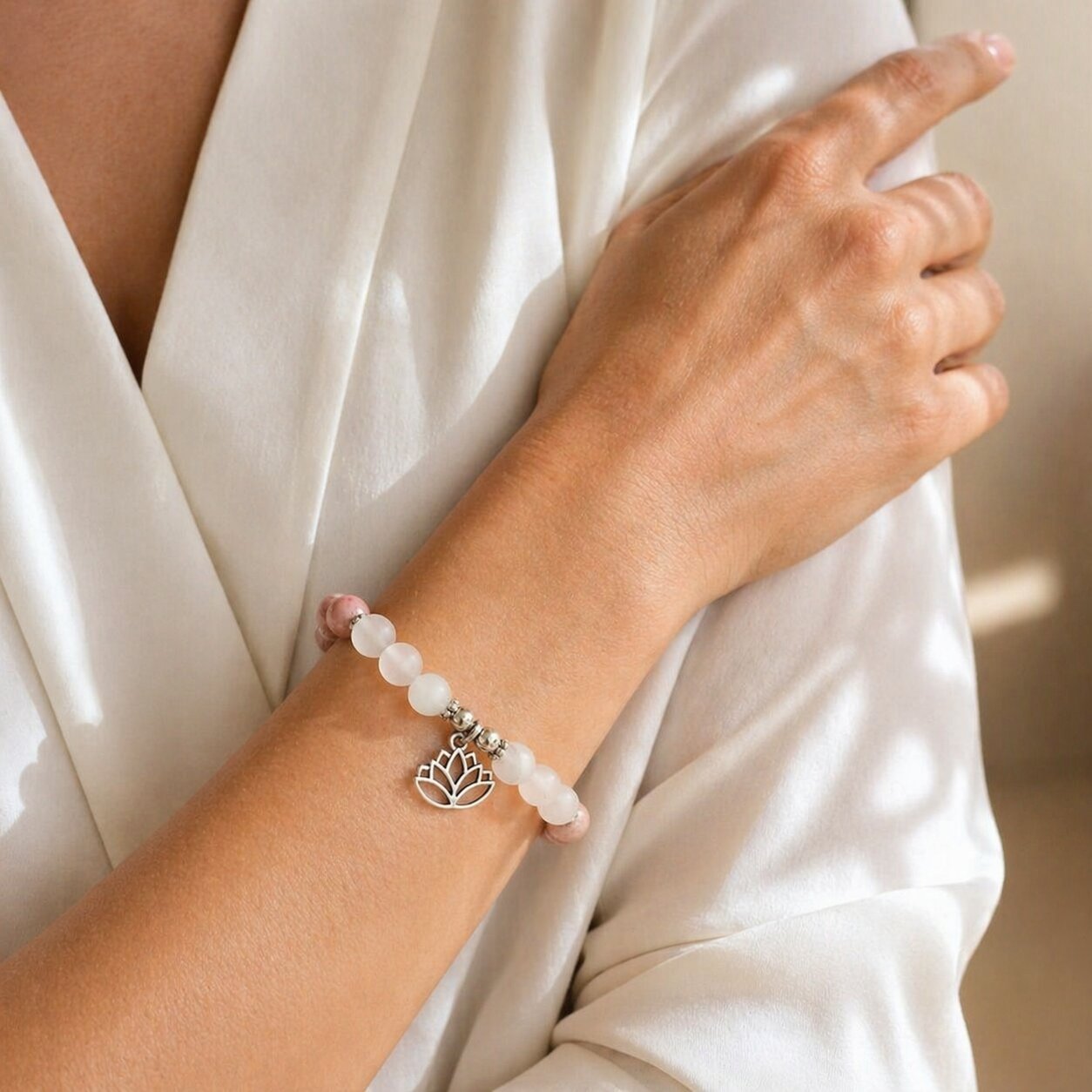Compassion Rose Quartz bracelet showing the natural variation of the pink gemstone beads.
