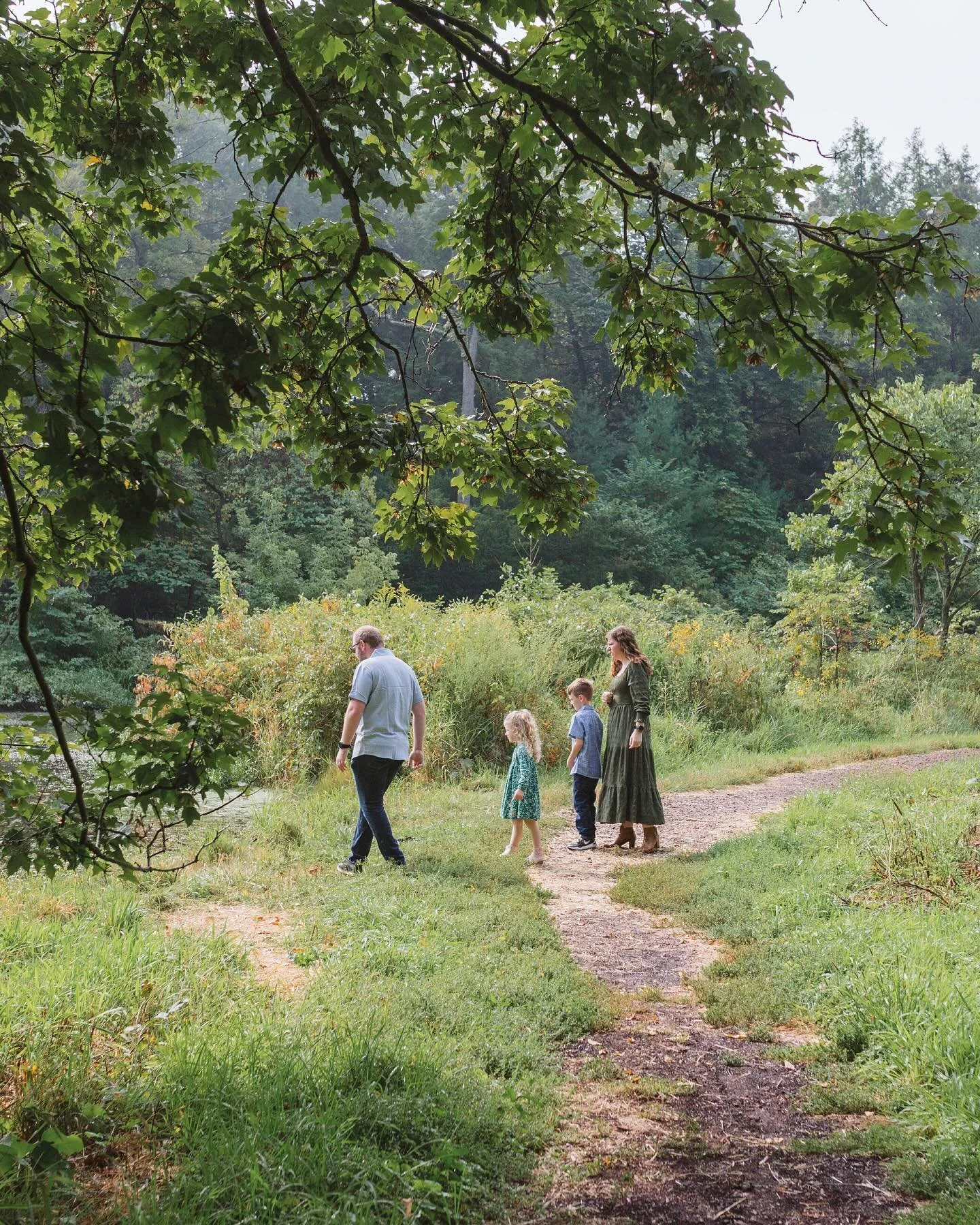 The morning began quiet and gray, the kind of light that holds its breath. The sun eventually found its way through the clouds, soft and golden against the trees. The kids ran ahead, finding paths I would have missed, their laughter stitching the qui