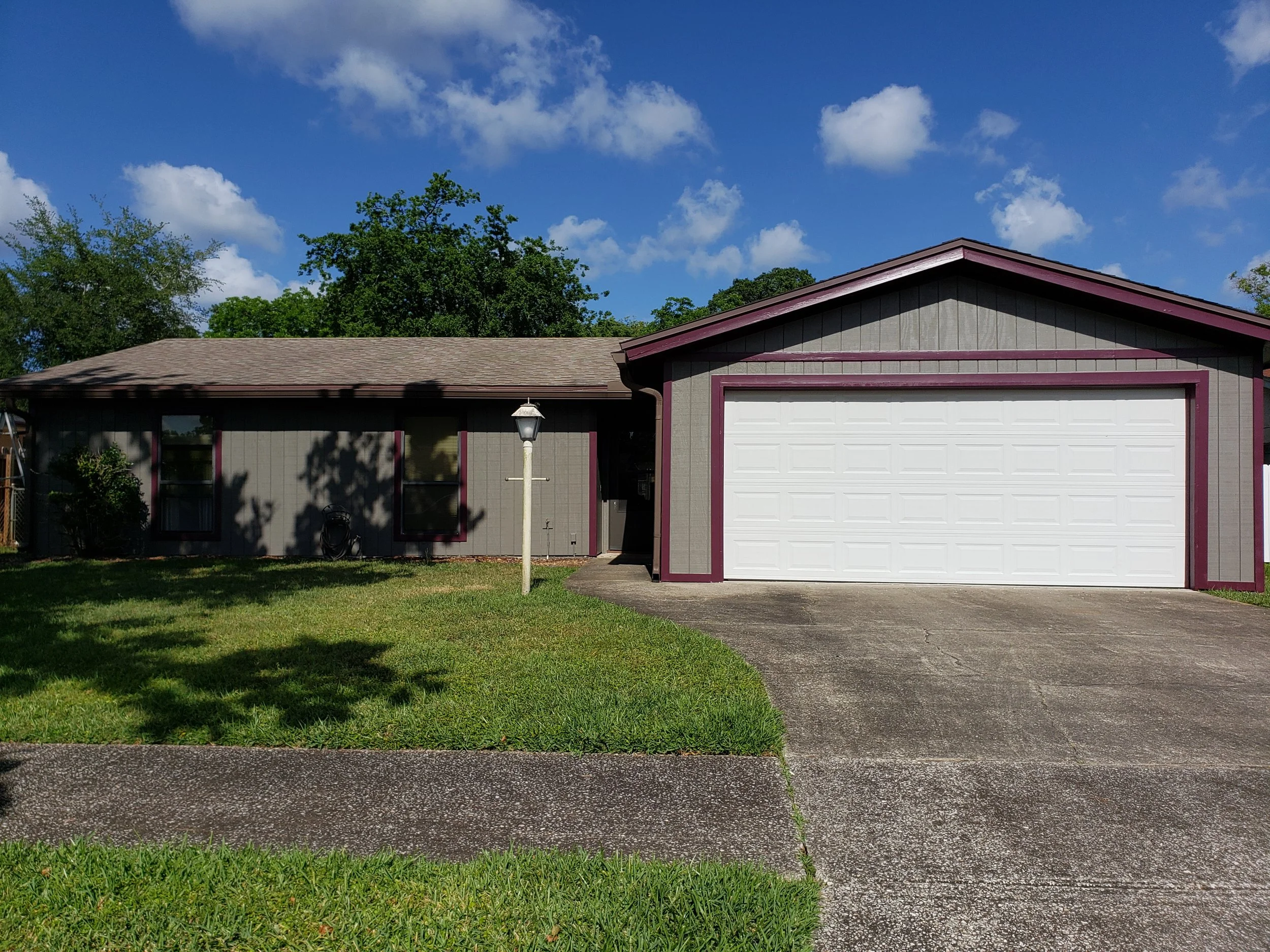 Jacksonville Fl. Exterior Repaint with some new T 1 -11 siding work recently installed. I caulked the seams putty all the screw holes then primed with a oil based primer and of course finished with the new body paint spraying and back rolling to ensu