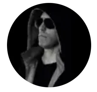 Black and white image of a woman wearing sunglasses, with long hair, and a dark outfit, holding her hand near her face.