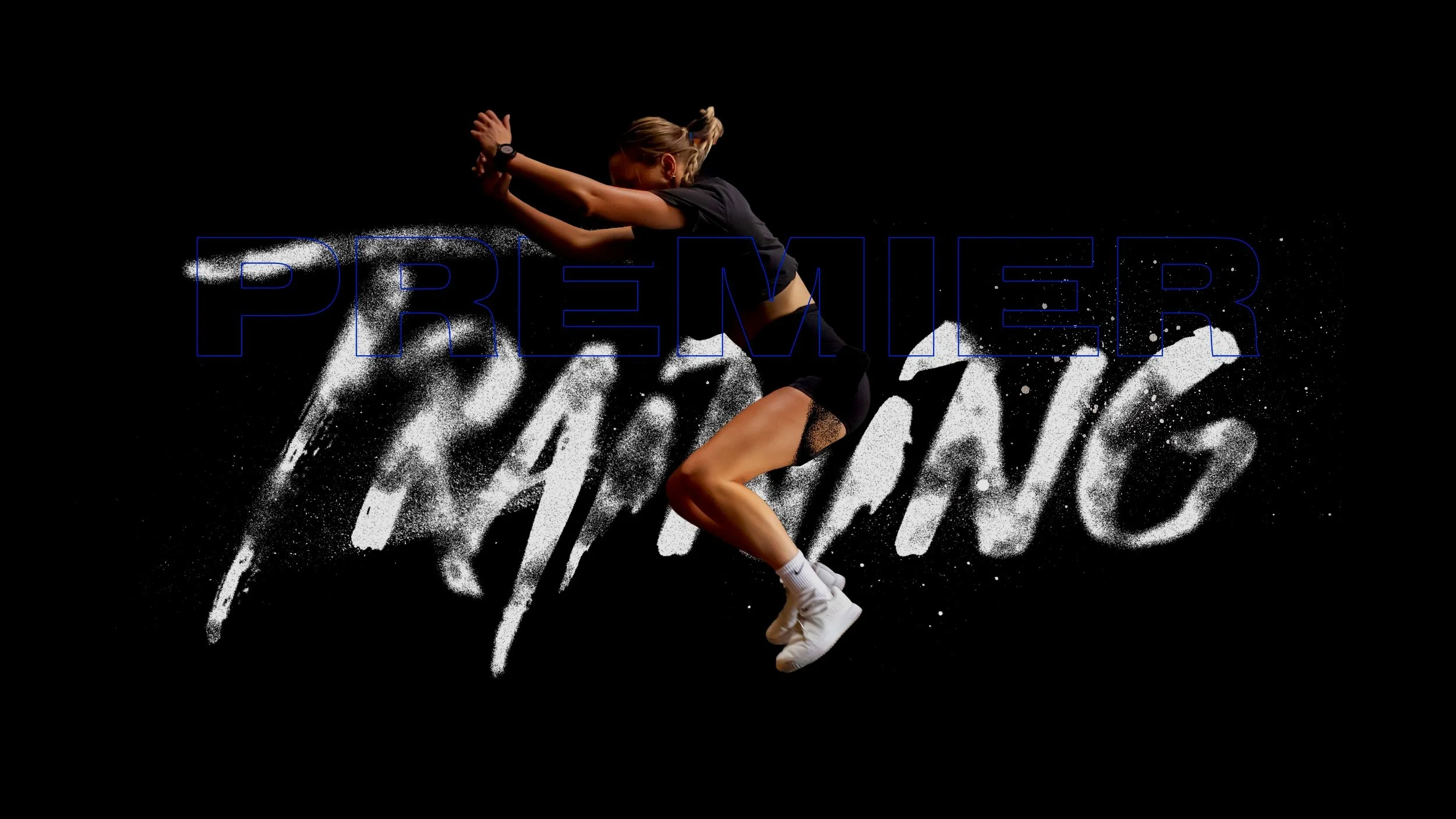 A woman in athletic clothing in mid-air performing a jump against a black background, with the word "PREMIER" overlaid in blue and a white splashy text behind her reading "JUMPING".
