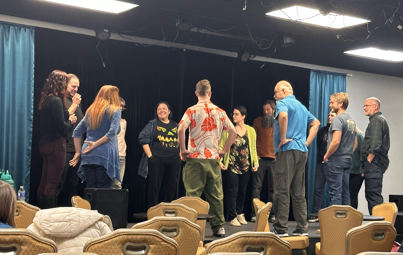 Students sharing the stage at Peak Improv Theater.