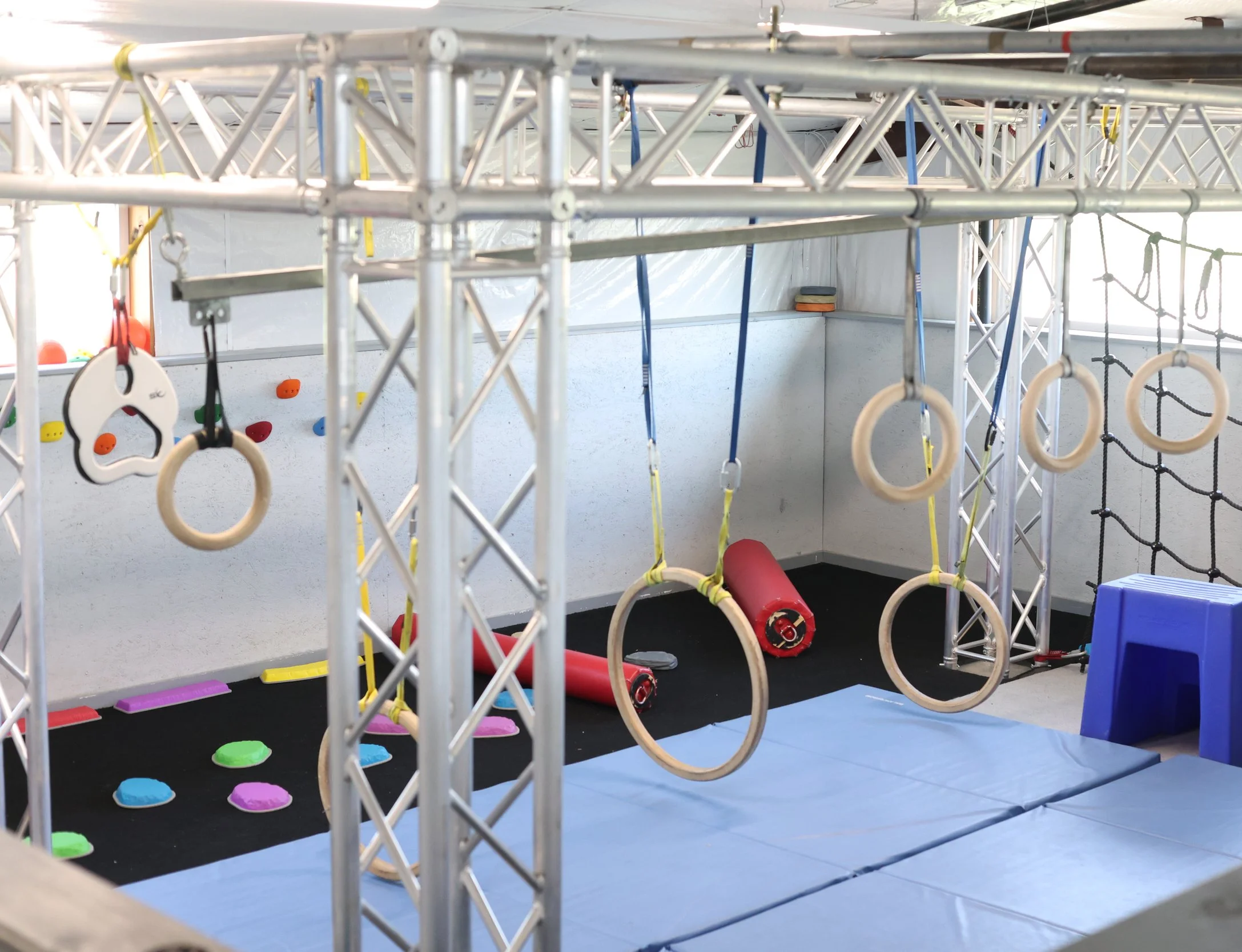 Mini Ninjas area for 2-4 year olds with balance courses, rings, and other fun obstacles.