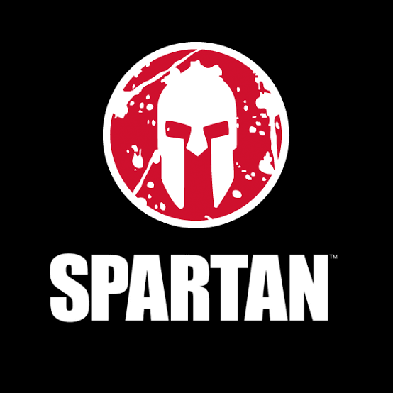 The image features a black background with a red and white Spartan helmet logo above the word "SPARTAN" in bold white capital letters.