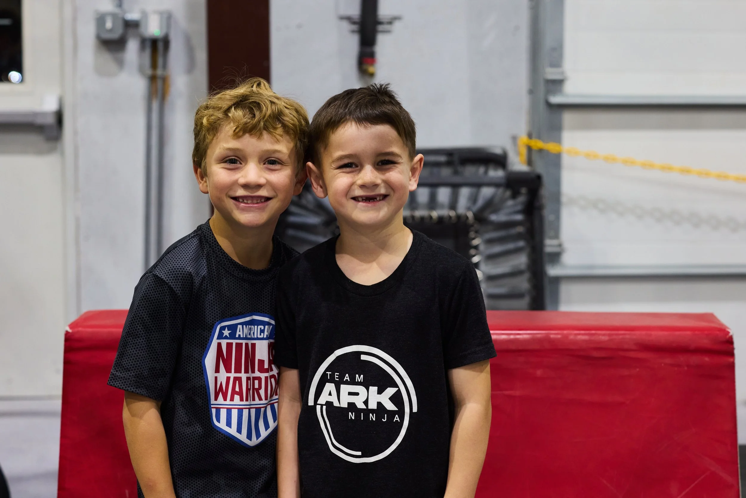 Young participants building friendships and confidence at Ark Ninja youth sports facility.