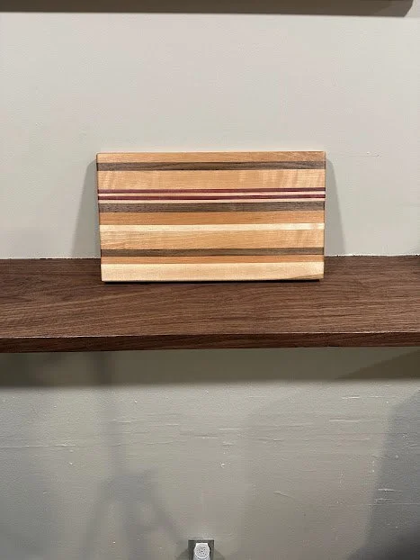 Cherry walnut purple heart cutting board