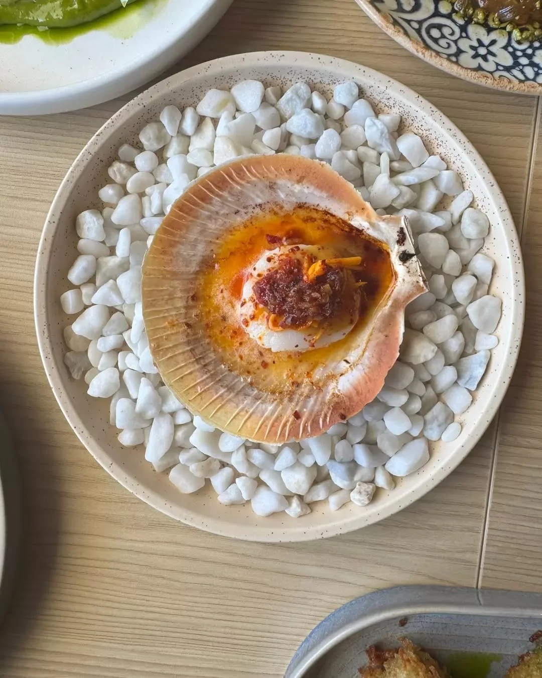 How can a tiny bite be so good? 

Our Abrolhos Island scallops have a new autumn treatment ~ now served with caramelised pumpkin butter, pickled pumpkin and sunflower shatta, some guests say they're even better than before! ❤️