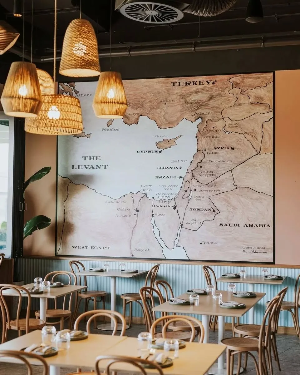 Every table has a story behind it.
The Levant ~ historically the eastern Mediterranean shores of Israel, Jordan, Lebanon, Syria, Turkey and Cyprus. This map above our dining room is where every dish begins.

Come in and let us take you there.

Lunch 