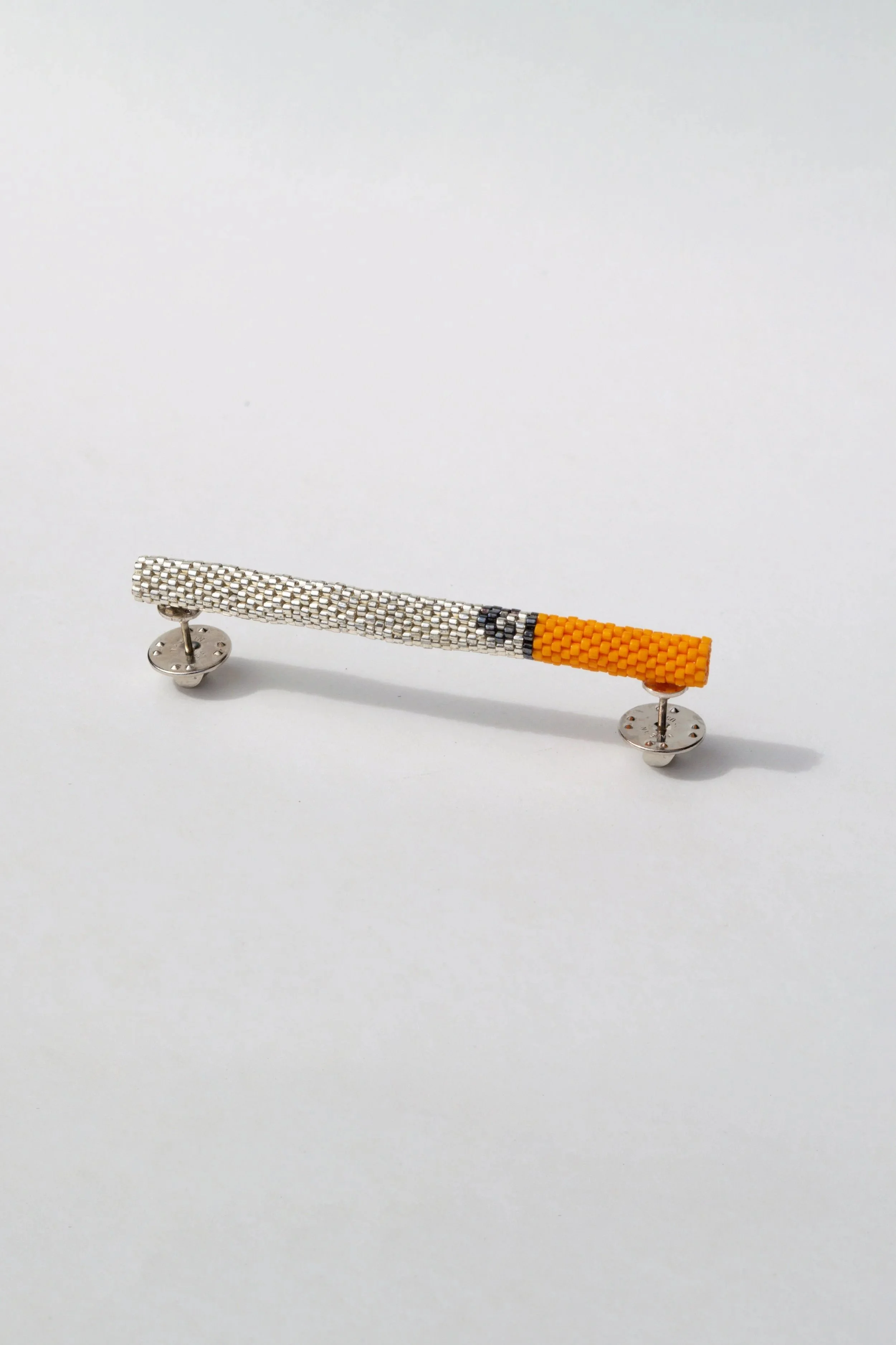 camel pin w/  TIE TACS