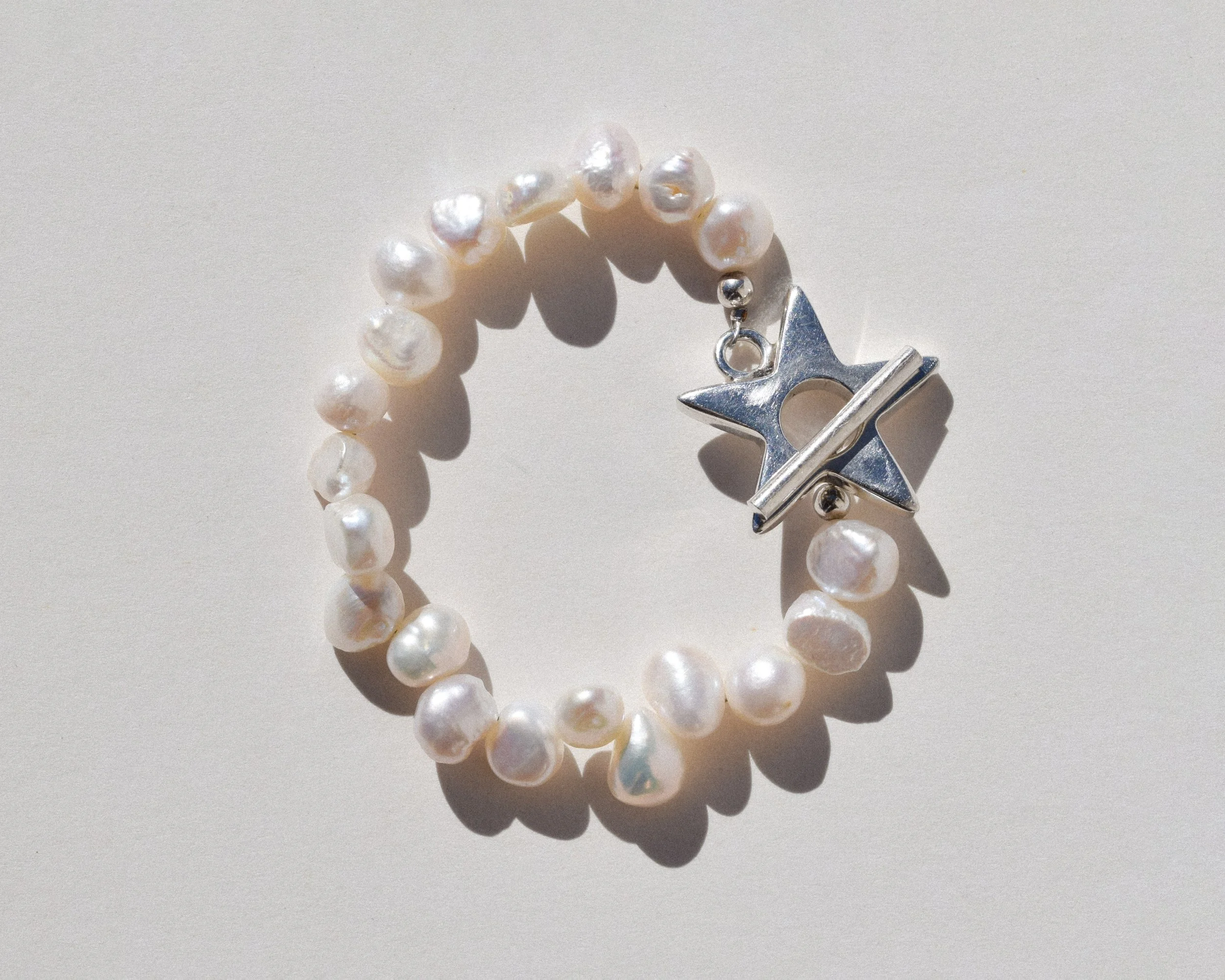 offset star pearl bracelet