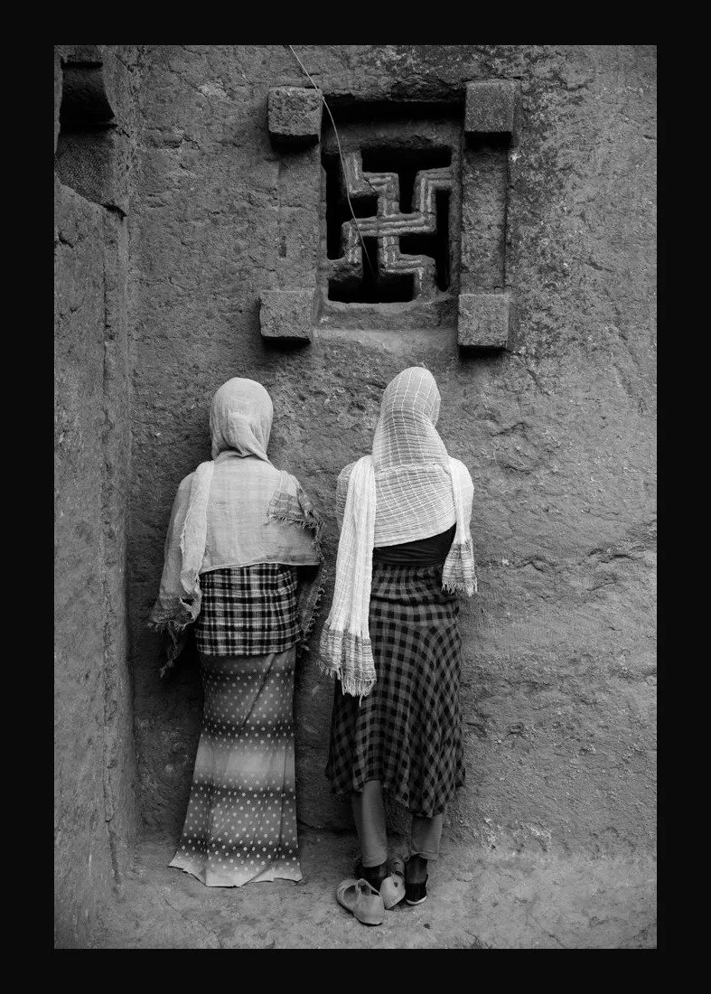 presence_05_women_cross_window.jpg