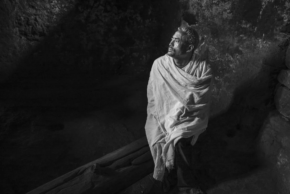 A devout pilgrim captured in solemn contemplation