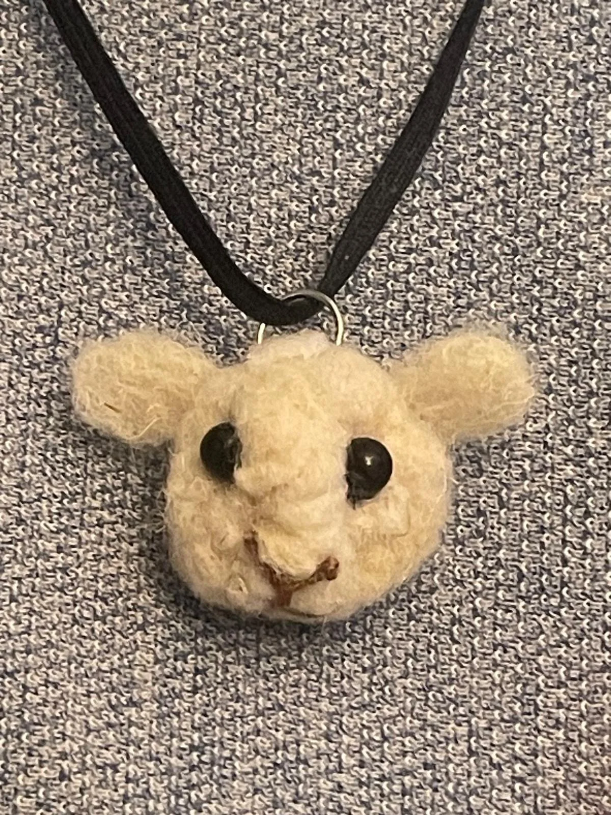 Sheep pendant close up