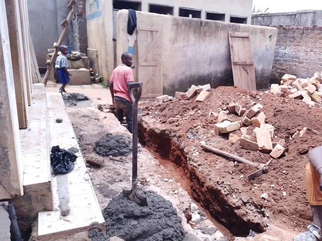 5.5 Clearing the area pit latrine.jpeg