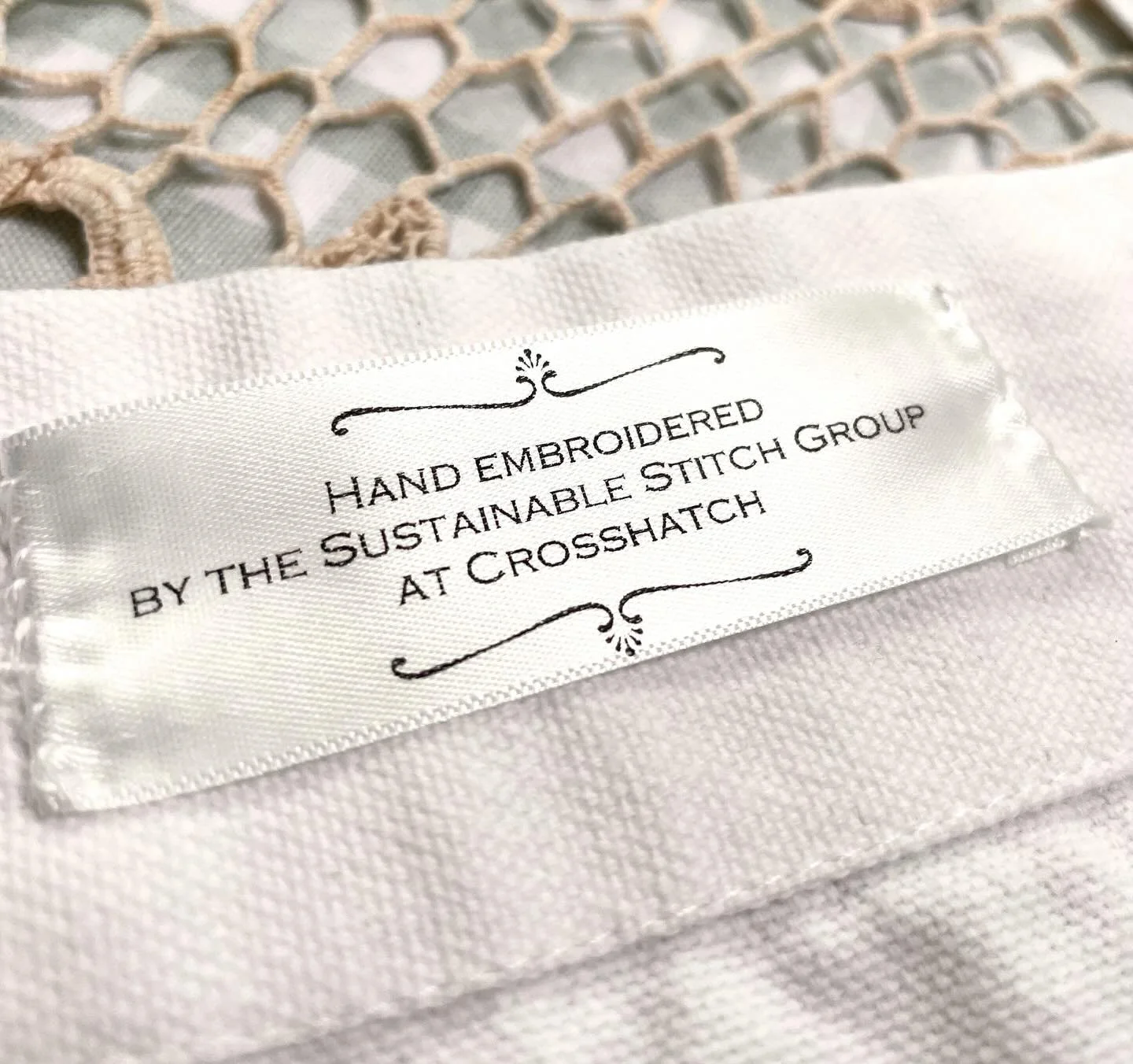 My wonderful Sustainable Stitch Group @crosshatchstudios continue to amaze me with the wonderful pieces they create. We are just completing a collaboration with @freecakesforkidsnorthwich , creating hand embroidered aprons for the talented bakers. Ea