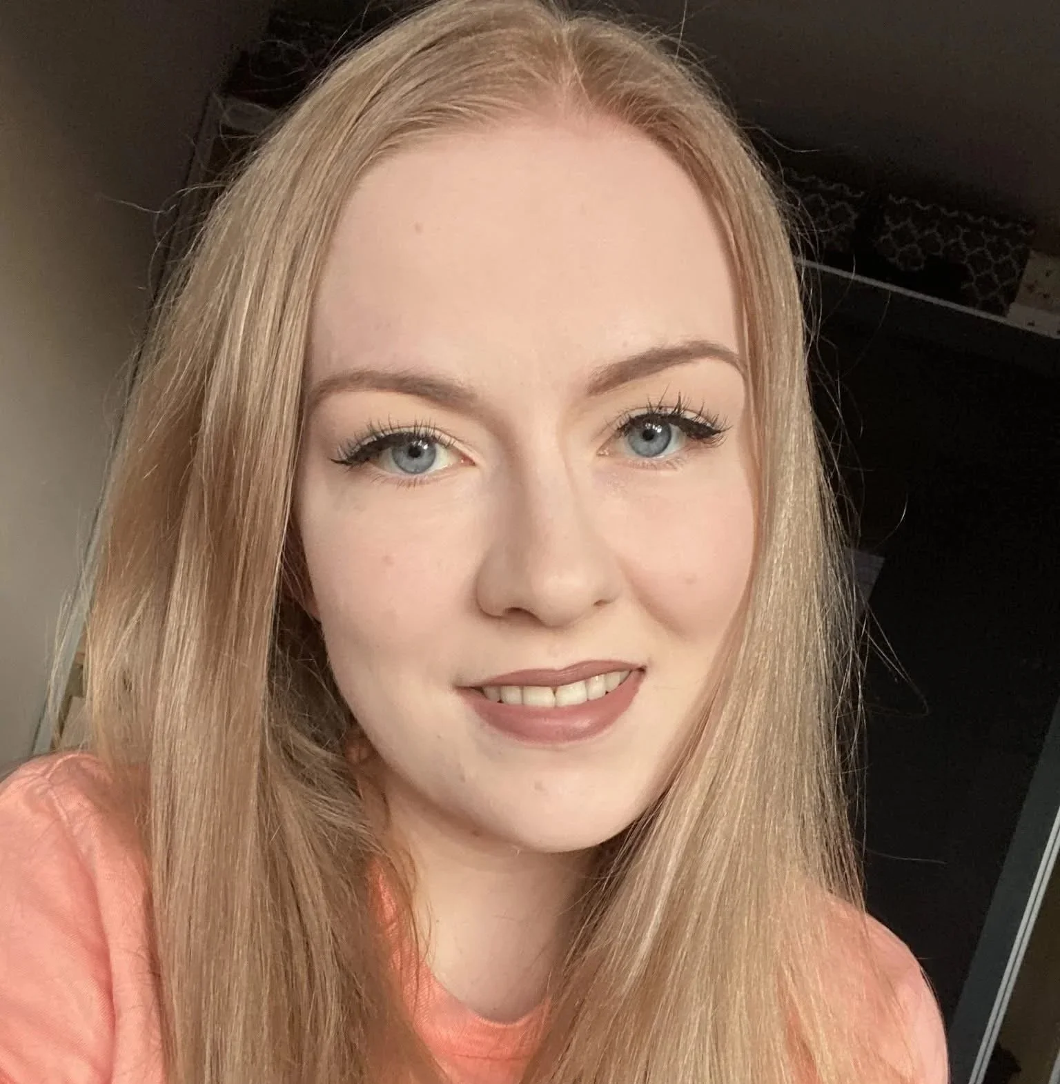 Erin May Baillie is a woman with long blonde hair.