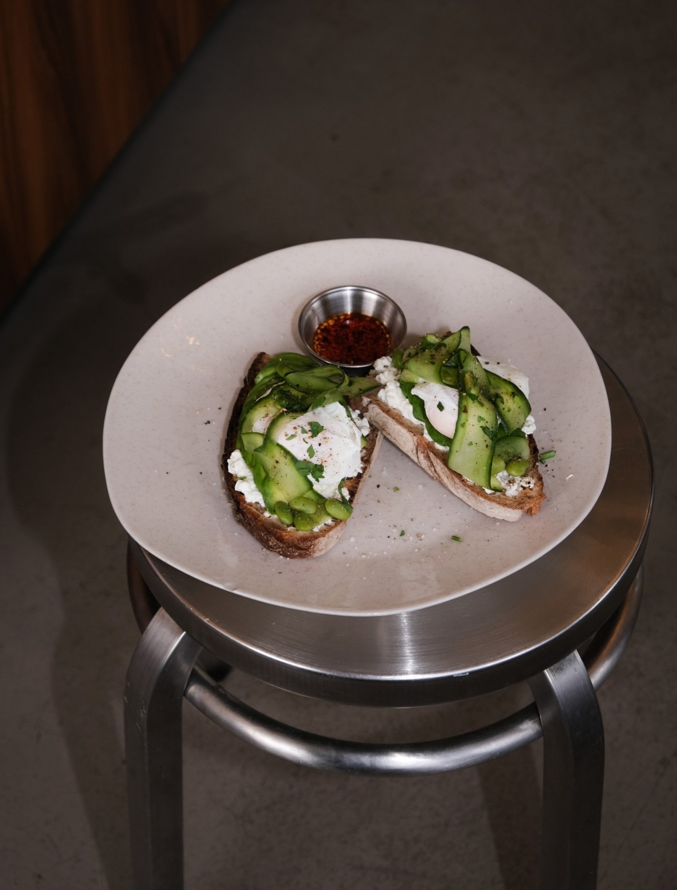 NEW ON THE MENU 

PROTEIN BOOST 
Cottage cheese, avocado, edamame, cucumber &amp; 2 poached eggs on sourdough bread with chili crunch