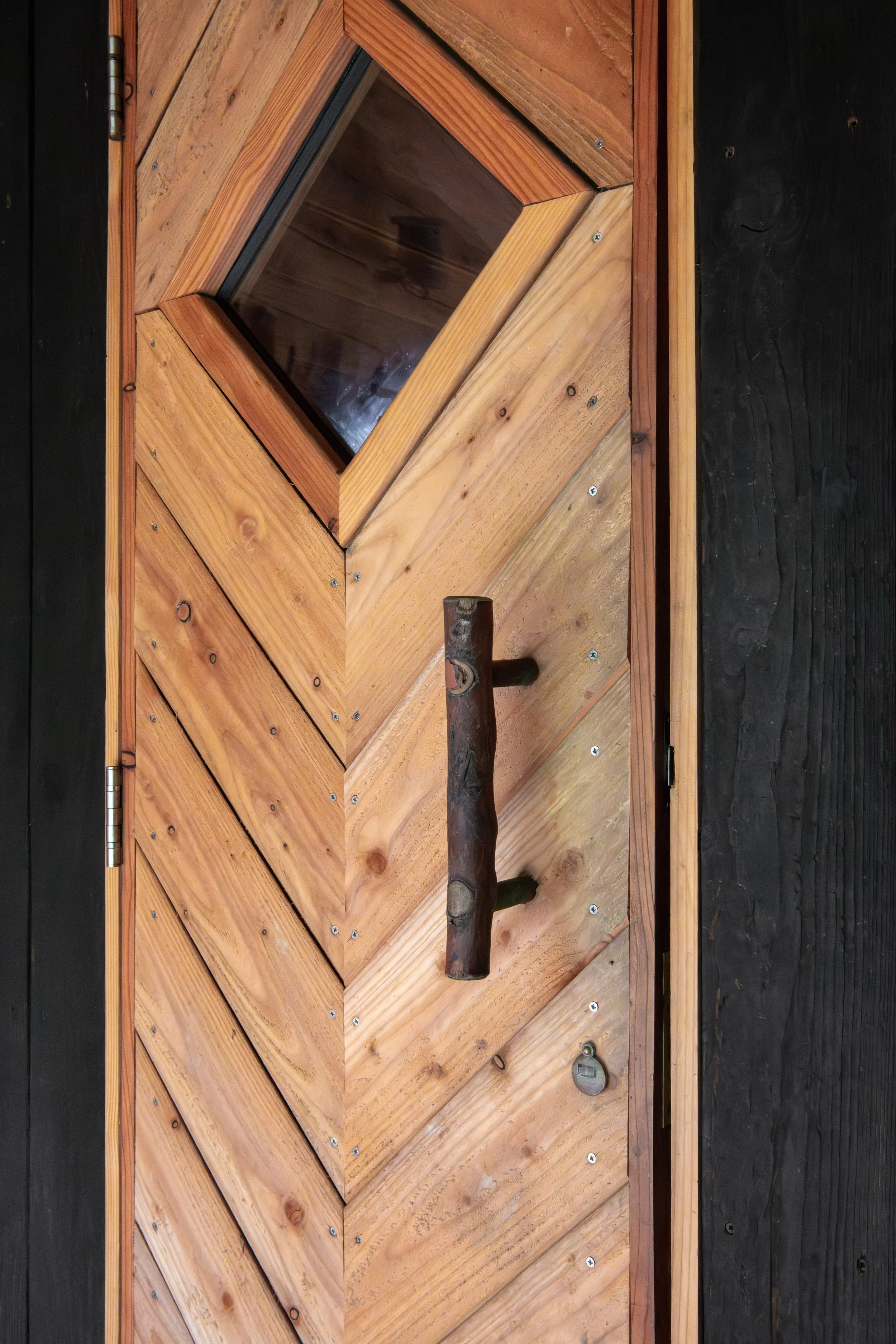 Custom wodden front-door for a sauna