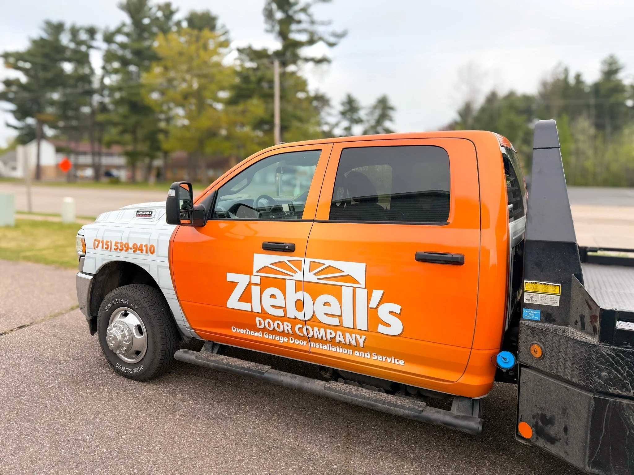Here&rsquo;s the new truck wrap we did for Ziebell Door Company! 🚪🧡

This design features their bold orange branding paired with a subtle white patterned background for a clean, professional look. Their trucks are hard to miss on the road.