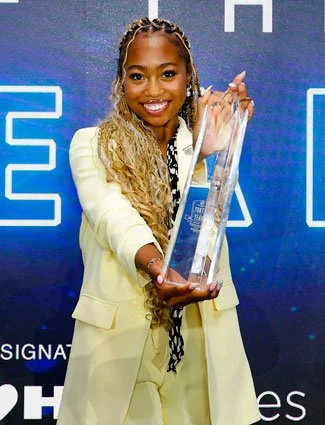 Eva-J-SE-MYOY-Winner-Photo-w-Trophy-2-PERSONALITY_325x425 (1).jpg