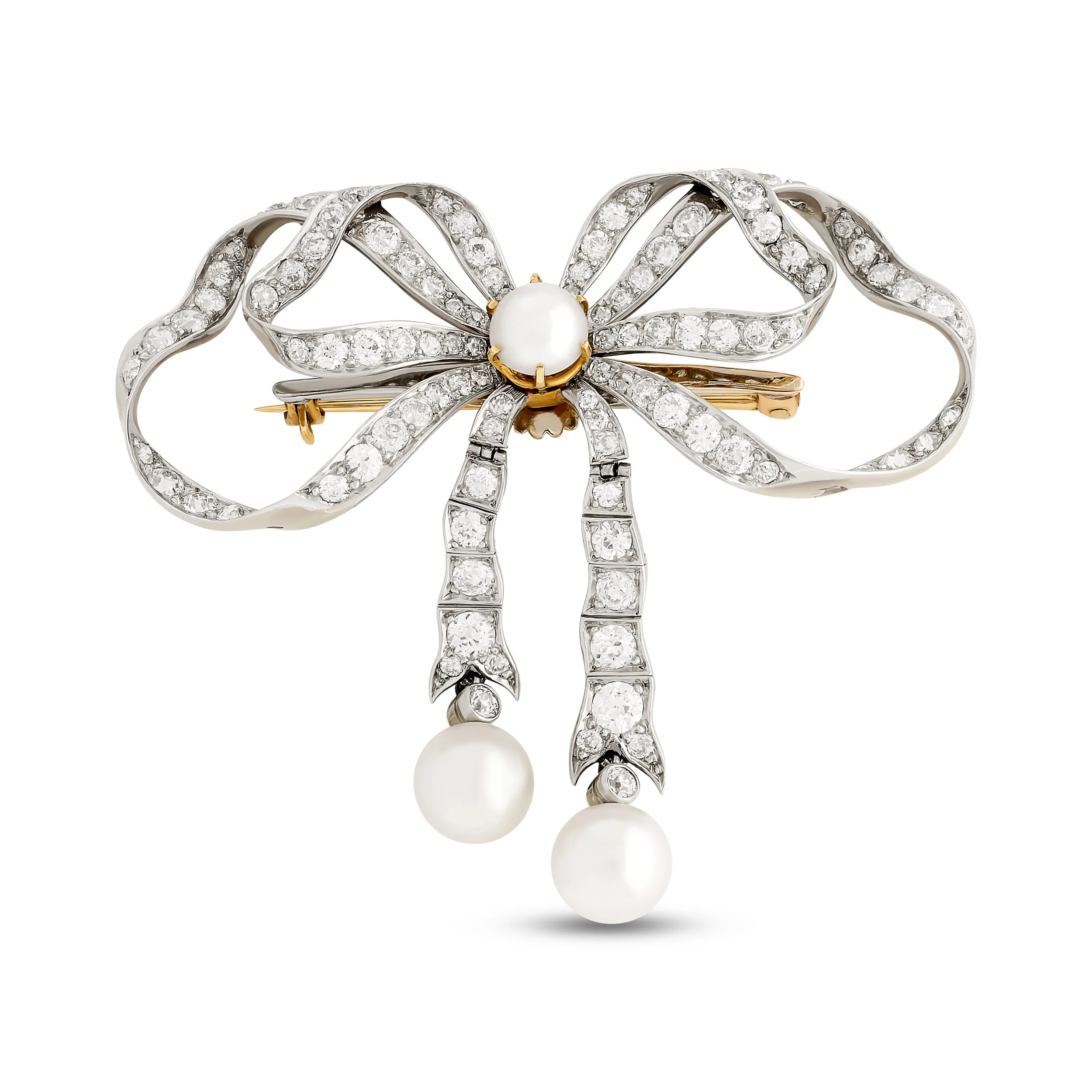 Platinum on yellow gold pearl and diamond bow brooch