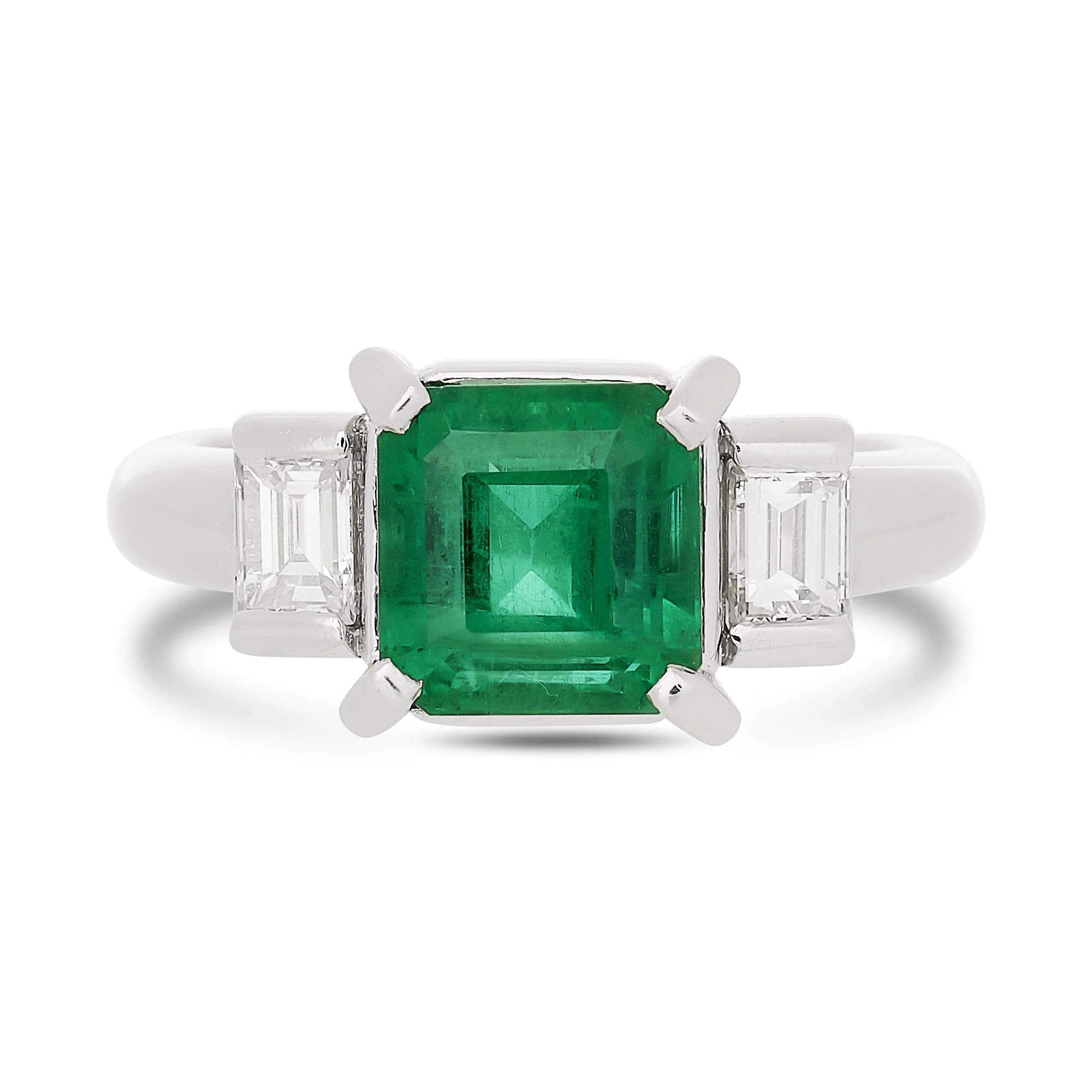 Platinum 2.31ct emerald and diamond three stone ring