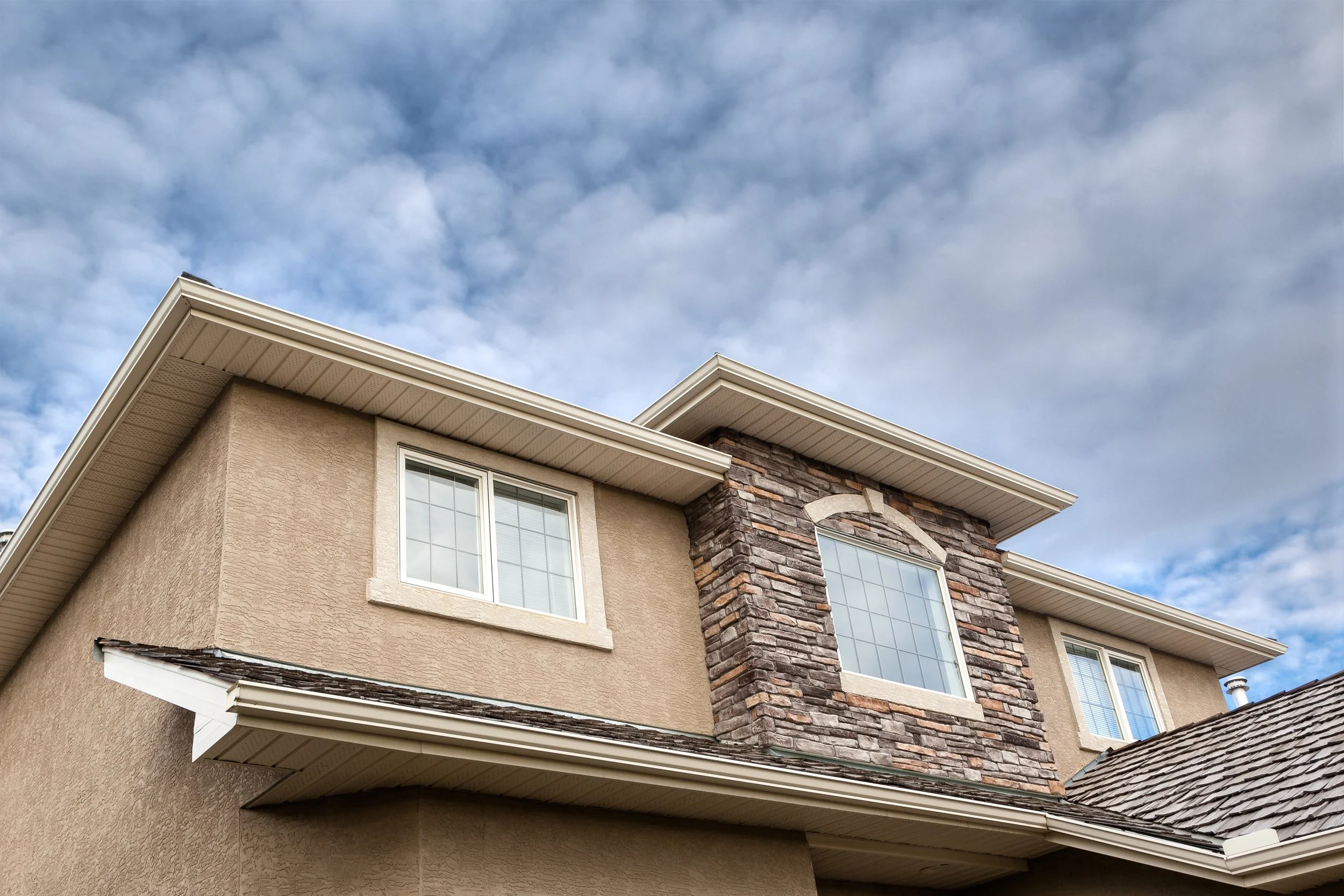 Stucco vs. Fiber Cement: Which Fire-Resistant Siding Is Best for Your Custom Home?