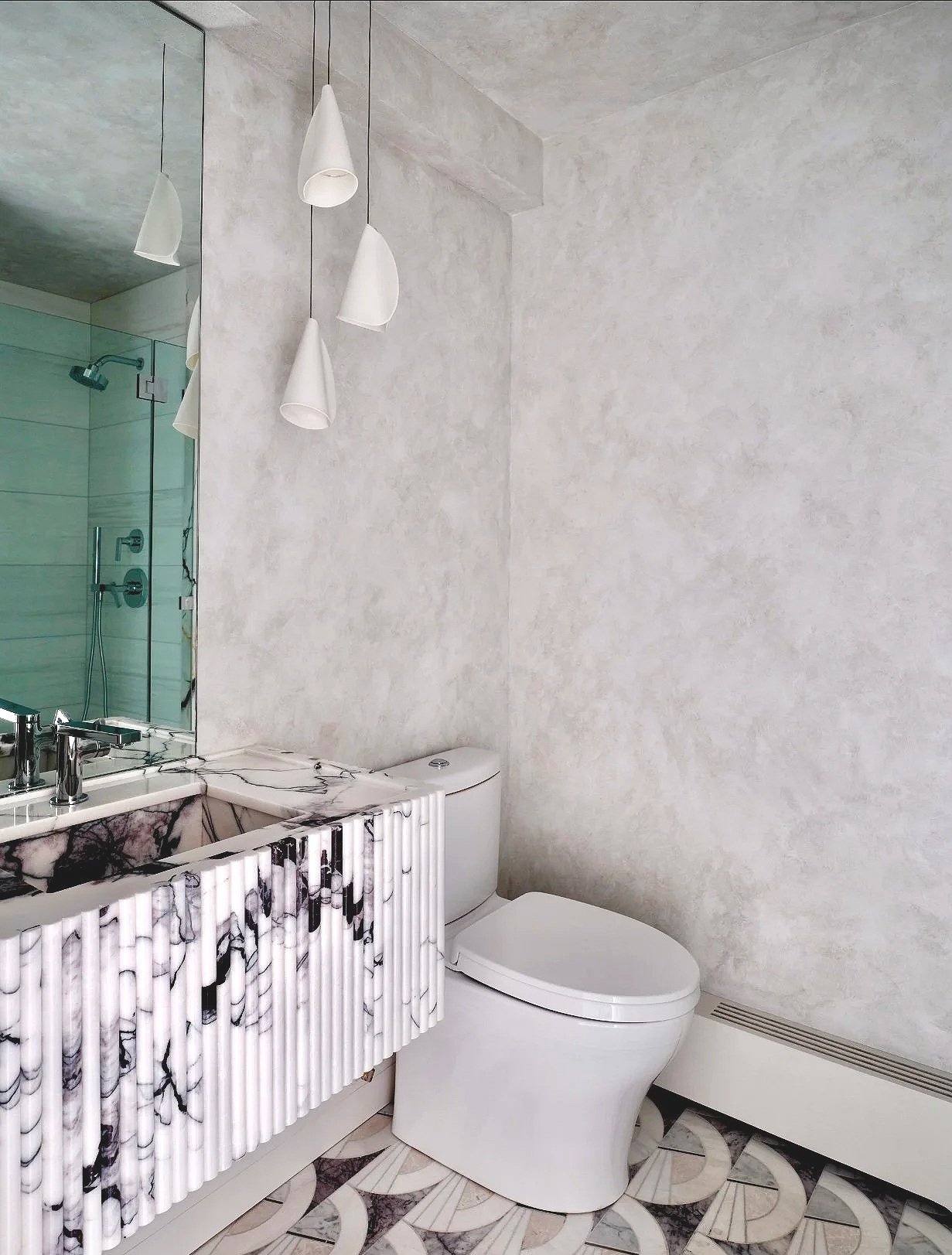 luxury bathroom design in New York, marble fluted, plaster walls, luxury lighting
