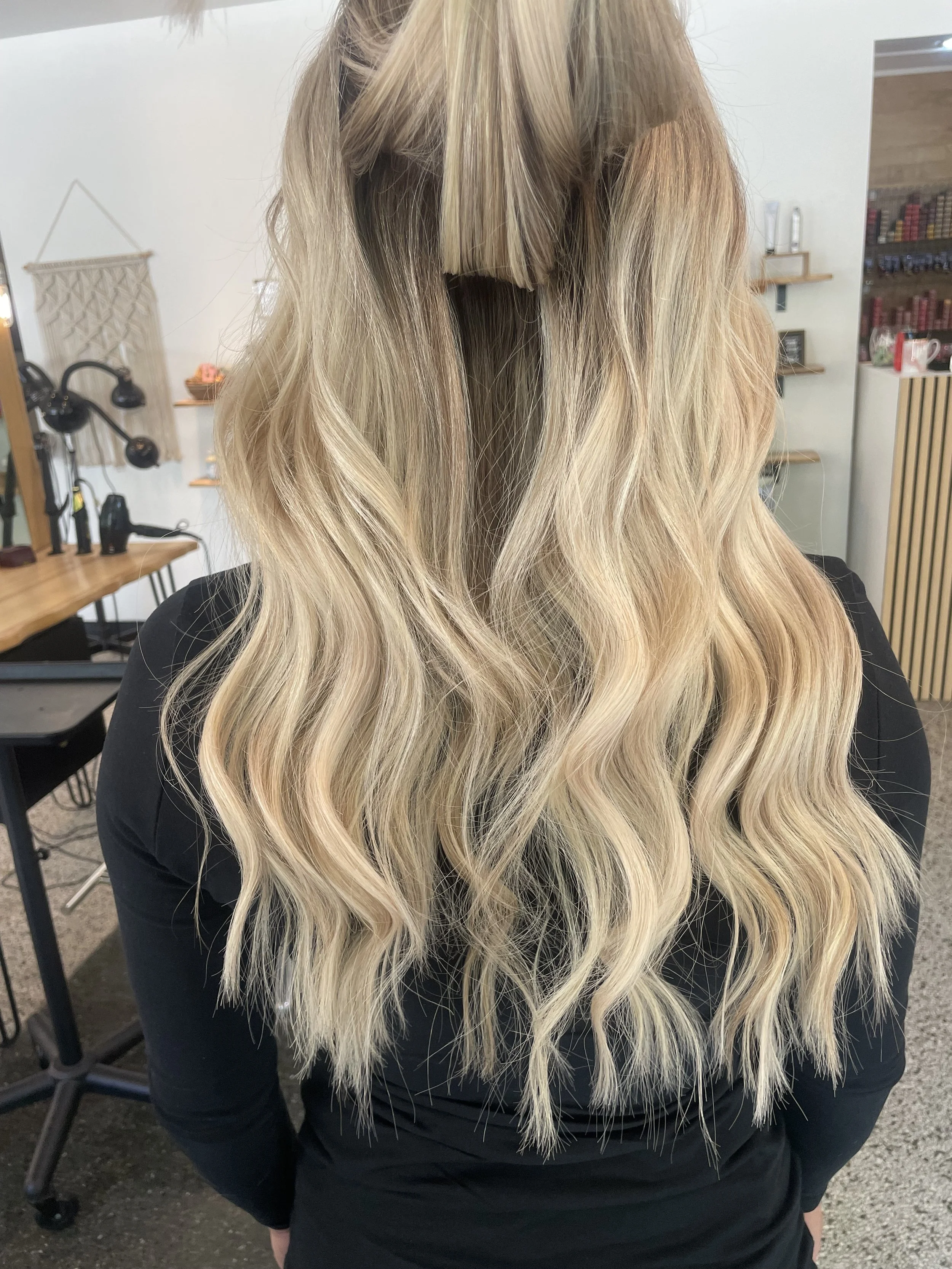 Invisible hidden bead hair extensions at Blend Salon & Suites