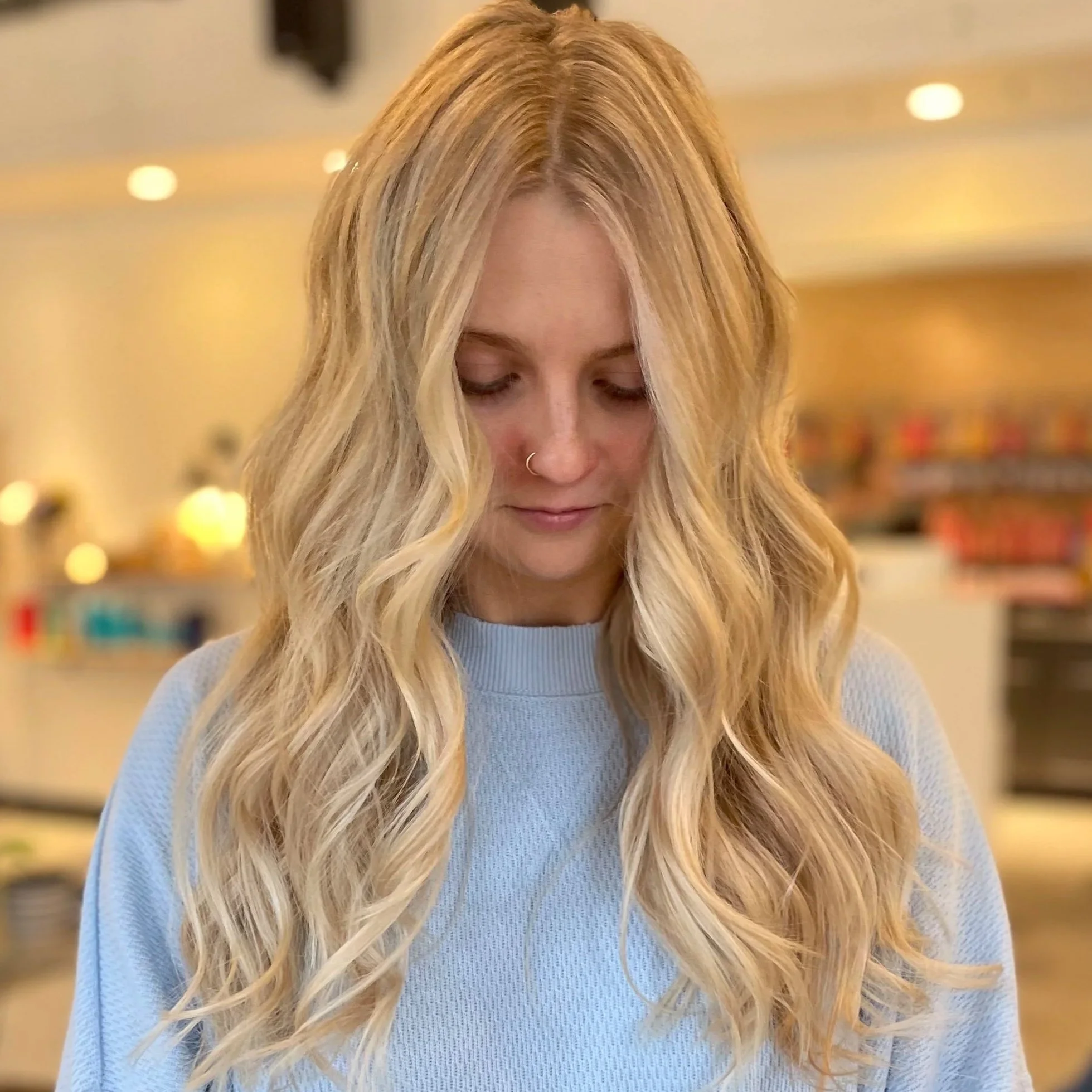 Hidden bead micro weft hair extensions at Blend Salon in Grand Rapids