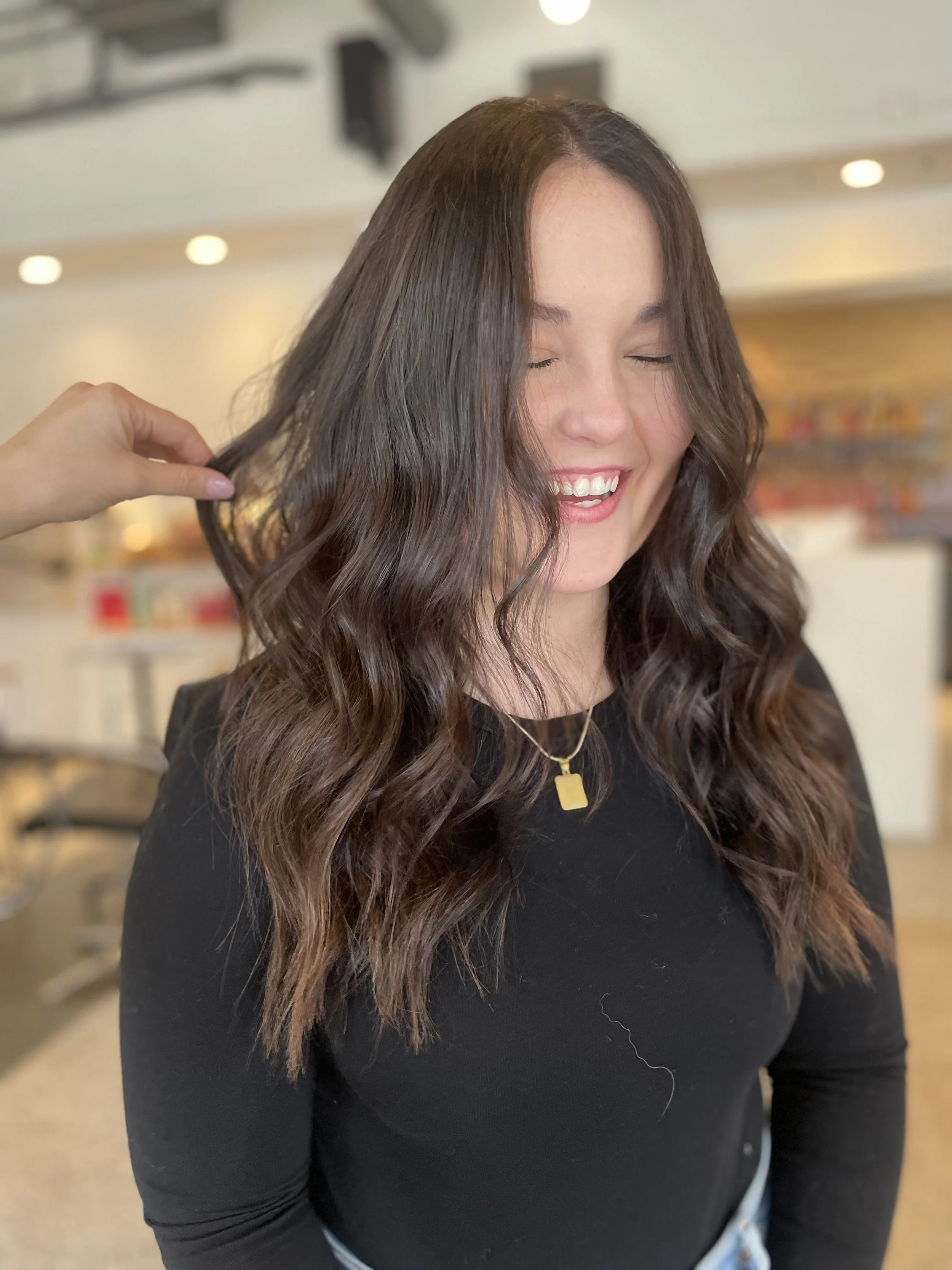 Hidden bead extensions adding fullness and length at Blend Salon Grand Rapids