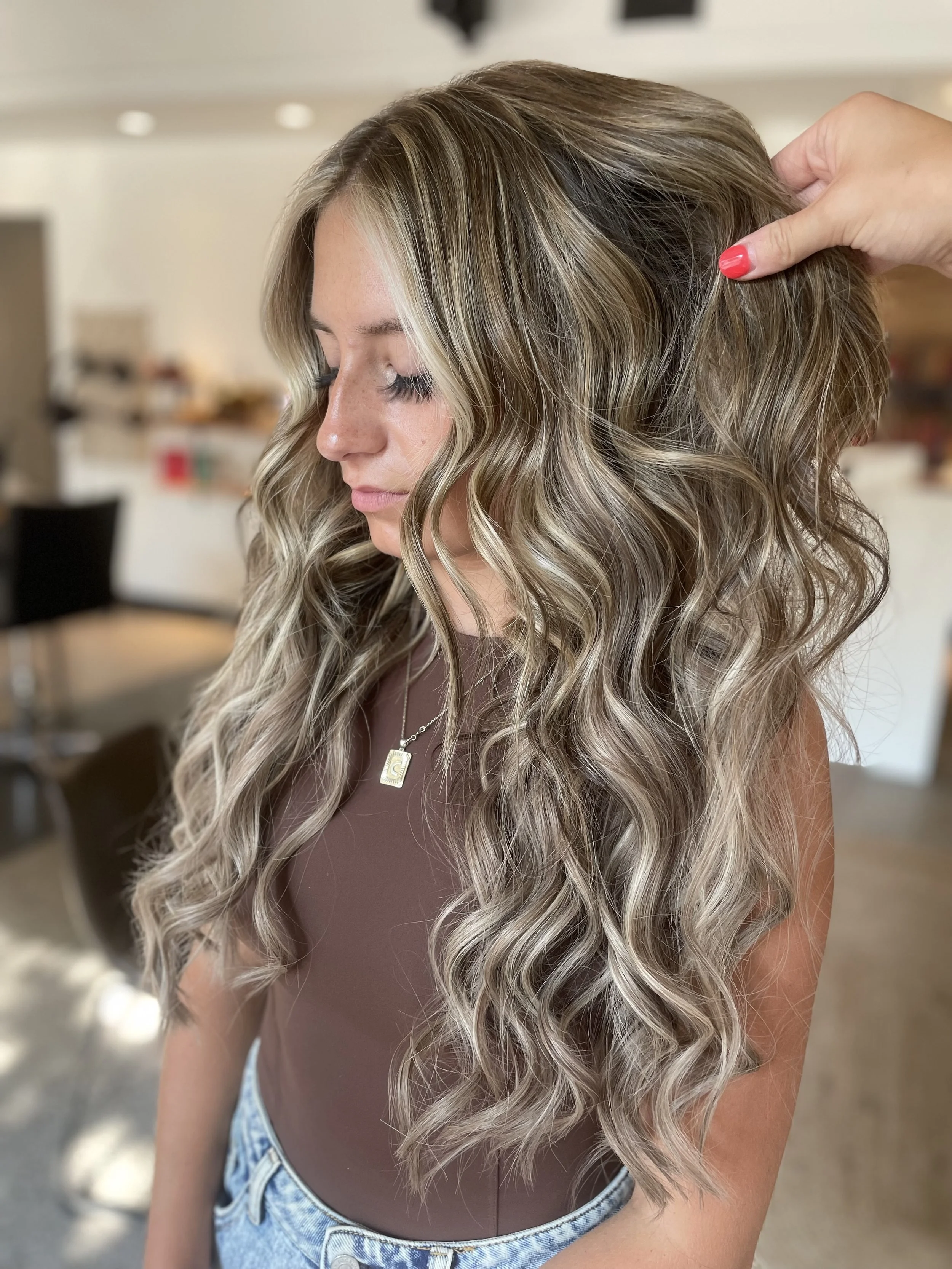 Blend Salon seamless hidden bead extensions for long, natural hair