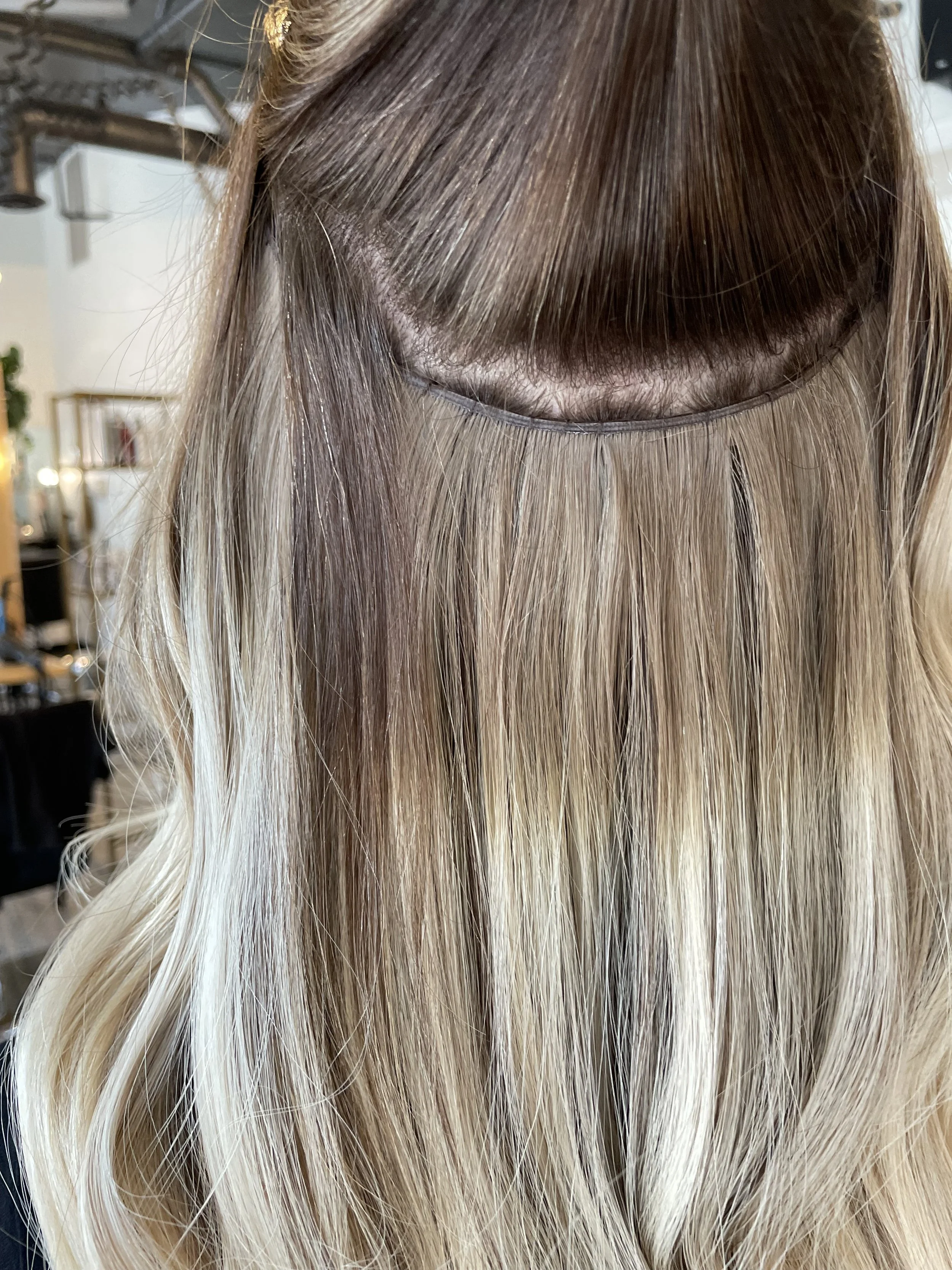 Grand Rapids salon offering micro weft extensions for length and volume