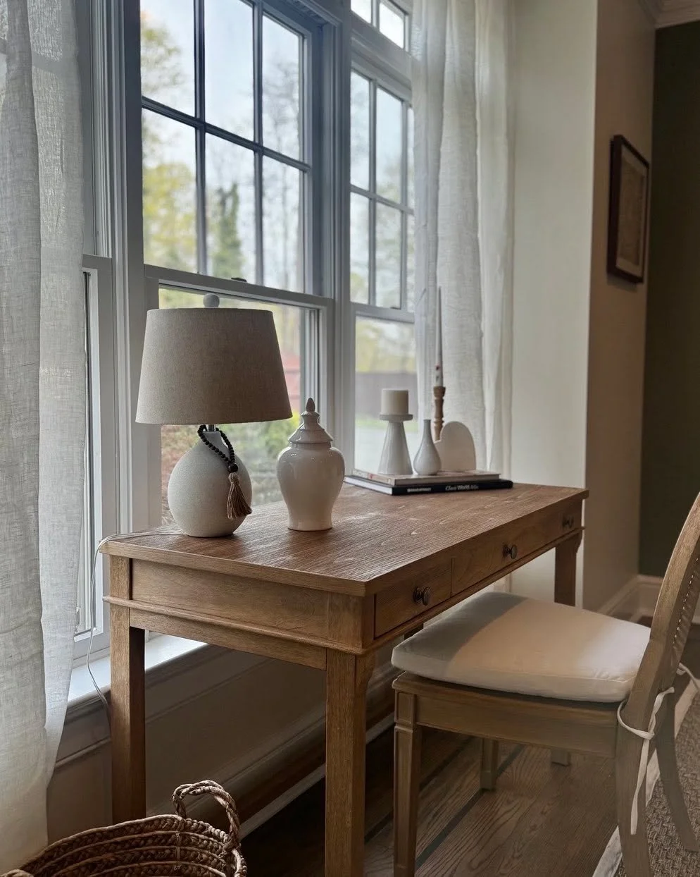 Pretty linen draperies complete the space perfectly, a very inexpensive way to add texture and airiness