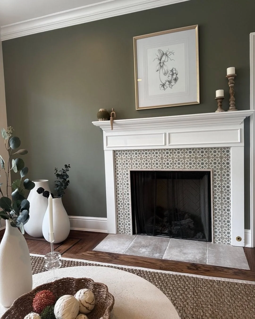 Updated a very tired fireplace, with some fun tile in keeping with the new color palette.