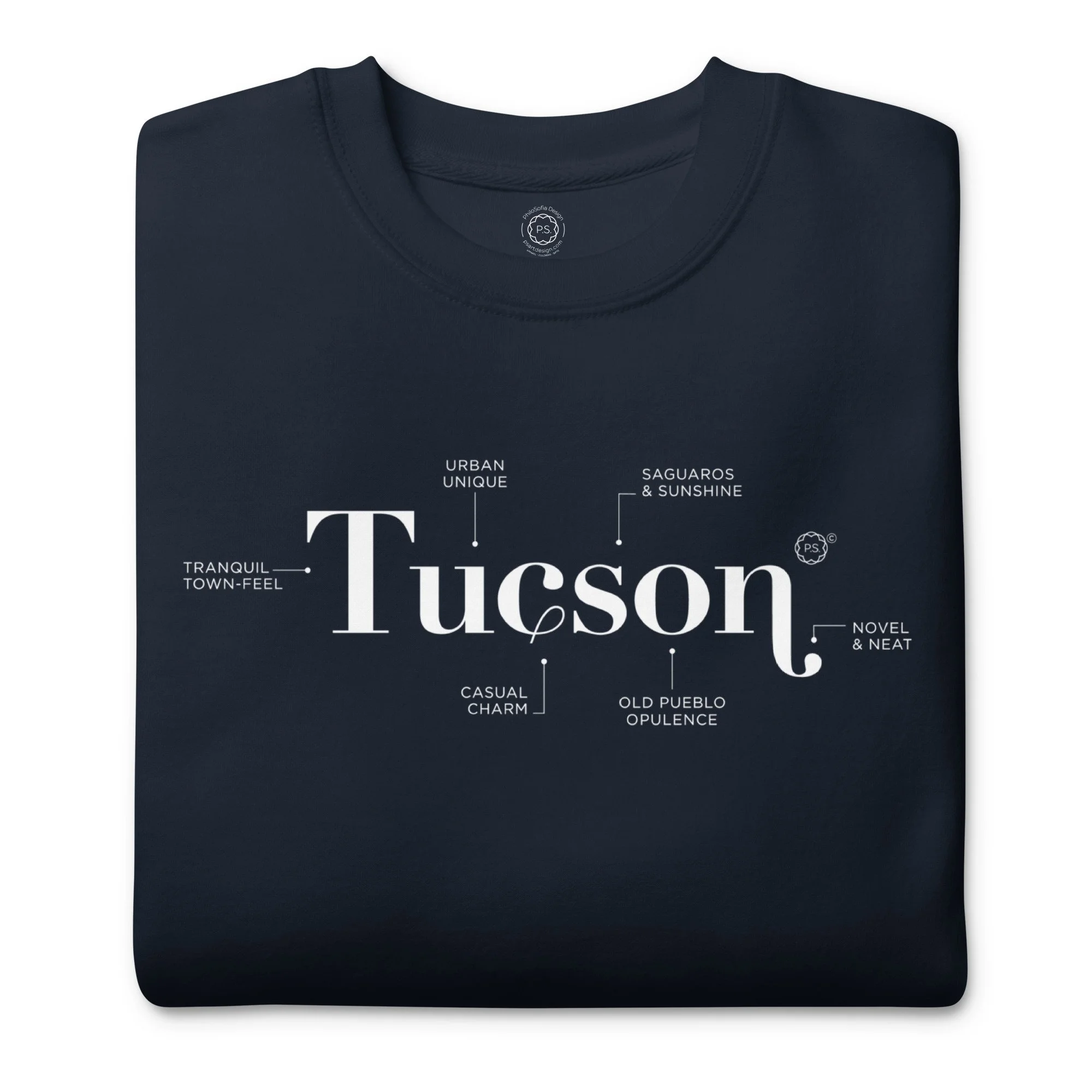 Close up of folded super soft Tucson Defined minimalist graphic sweatshirt in classic Navy Blazer.